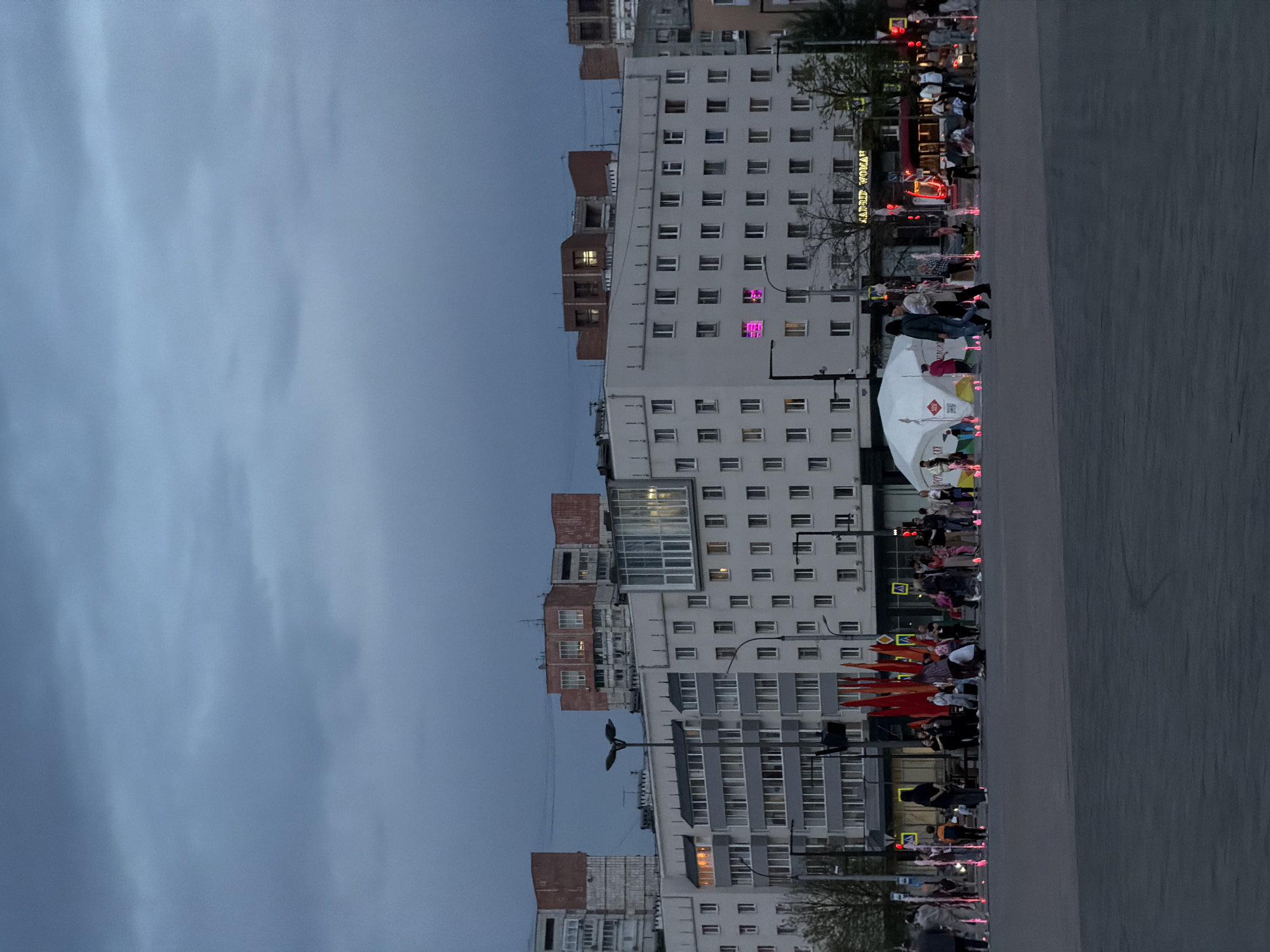 Evening street life captured in Perm city square