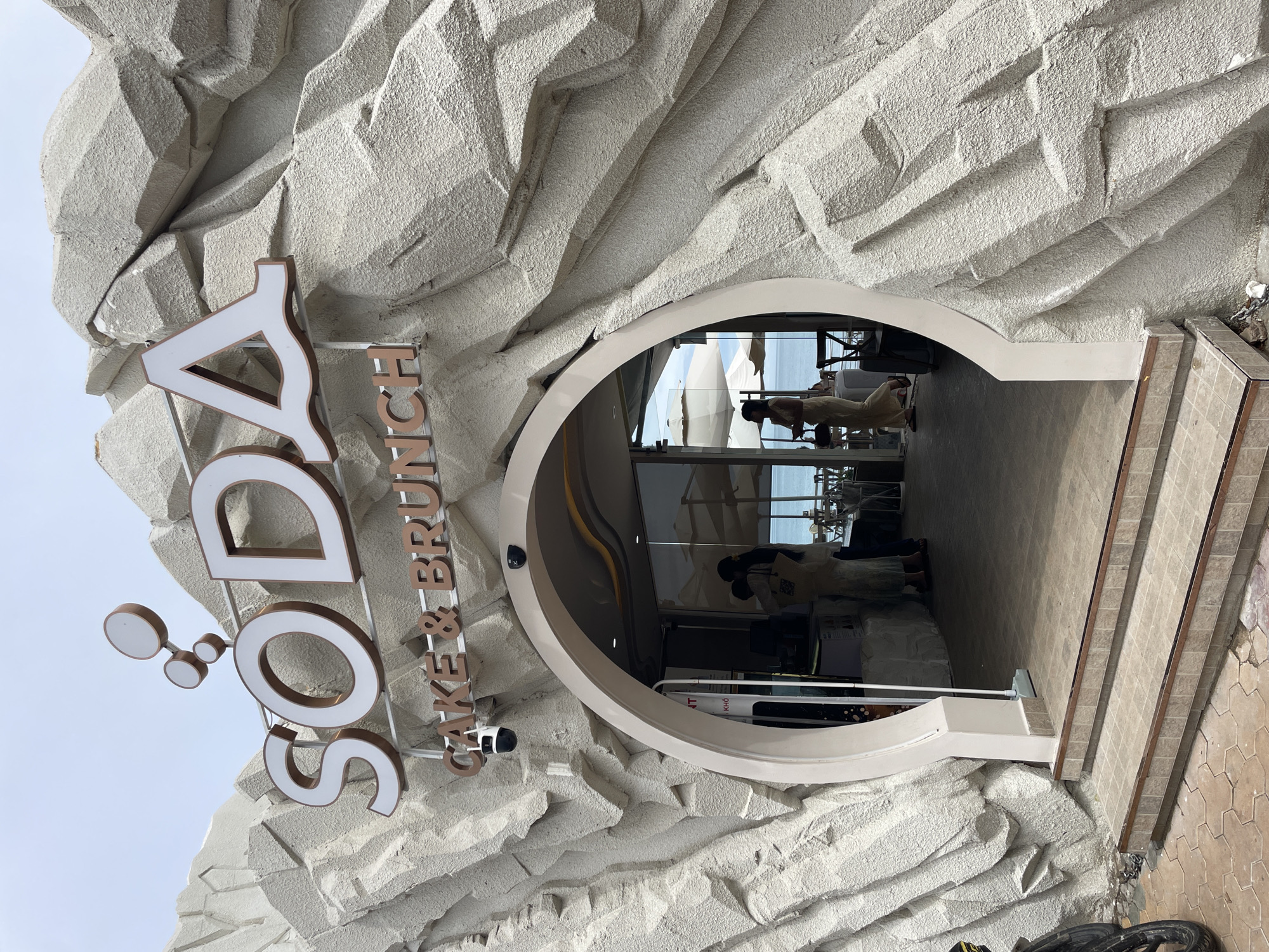 Woman takes selfie at uniquely designed Vietnamese brunch restaurant