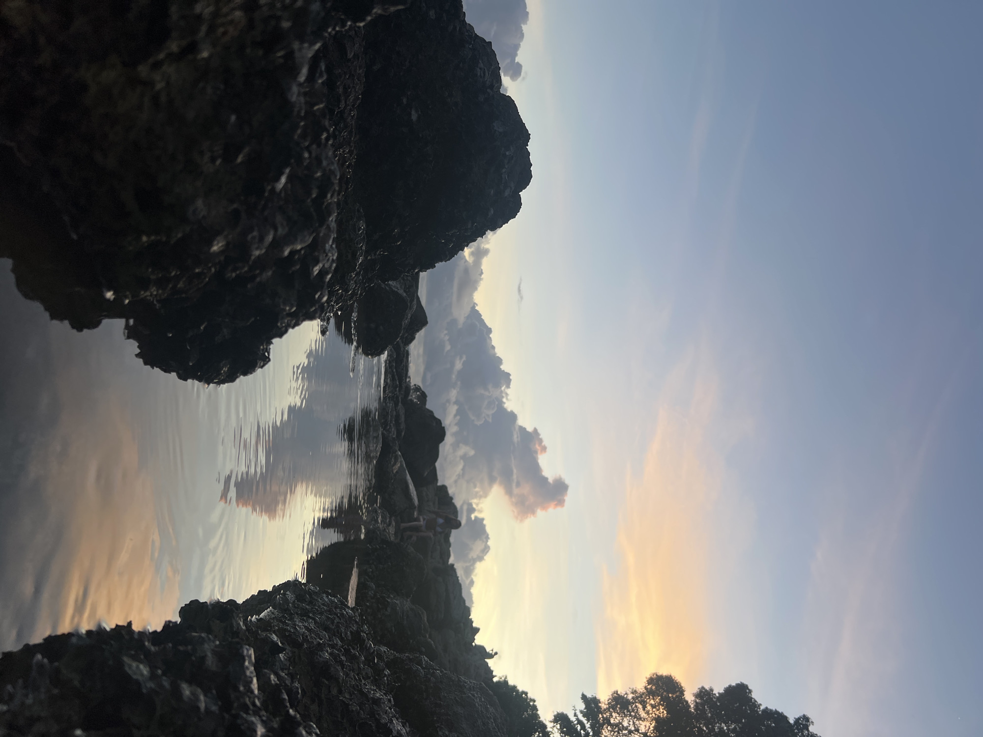 Rocky Choeng Thale shore at golden hour, fishing to cliff jumps
