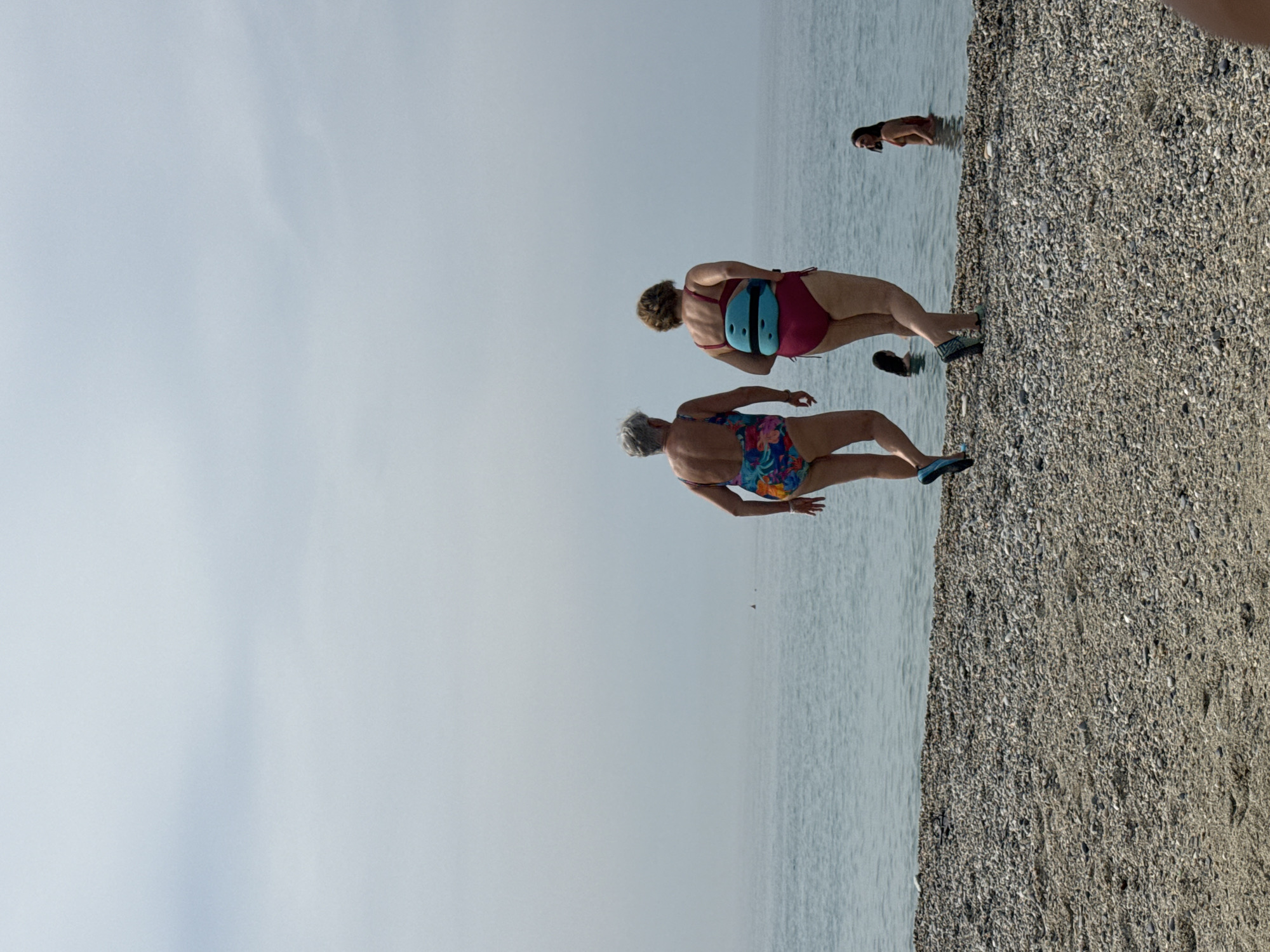 Summer morning on the pebble beach at Finale Ligure