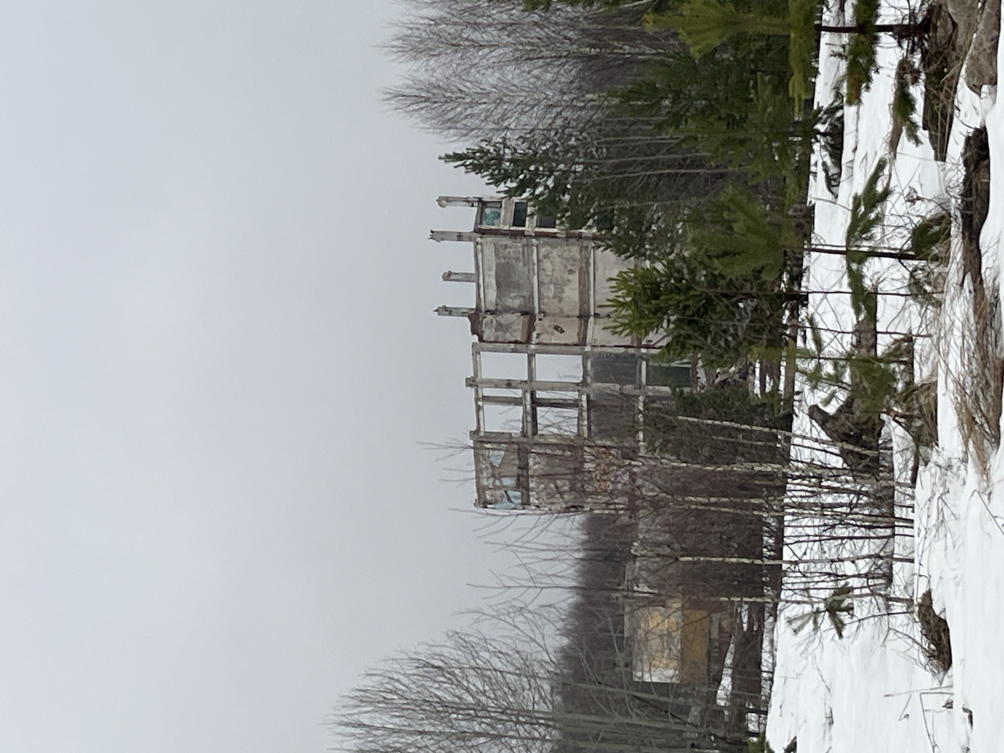 Winter documentation reveals abandoned structures in Марковский, Russia