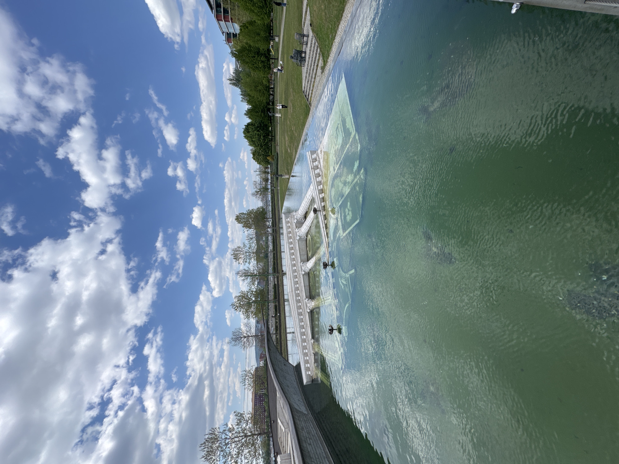 Budapest public space with reflecting pool documented by witnesses