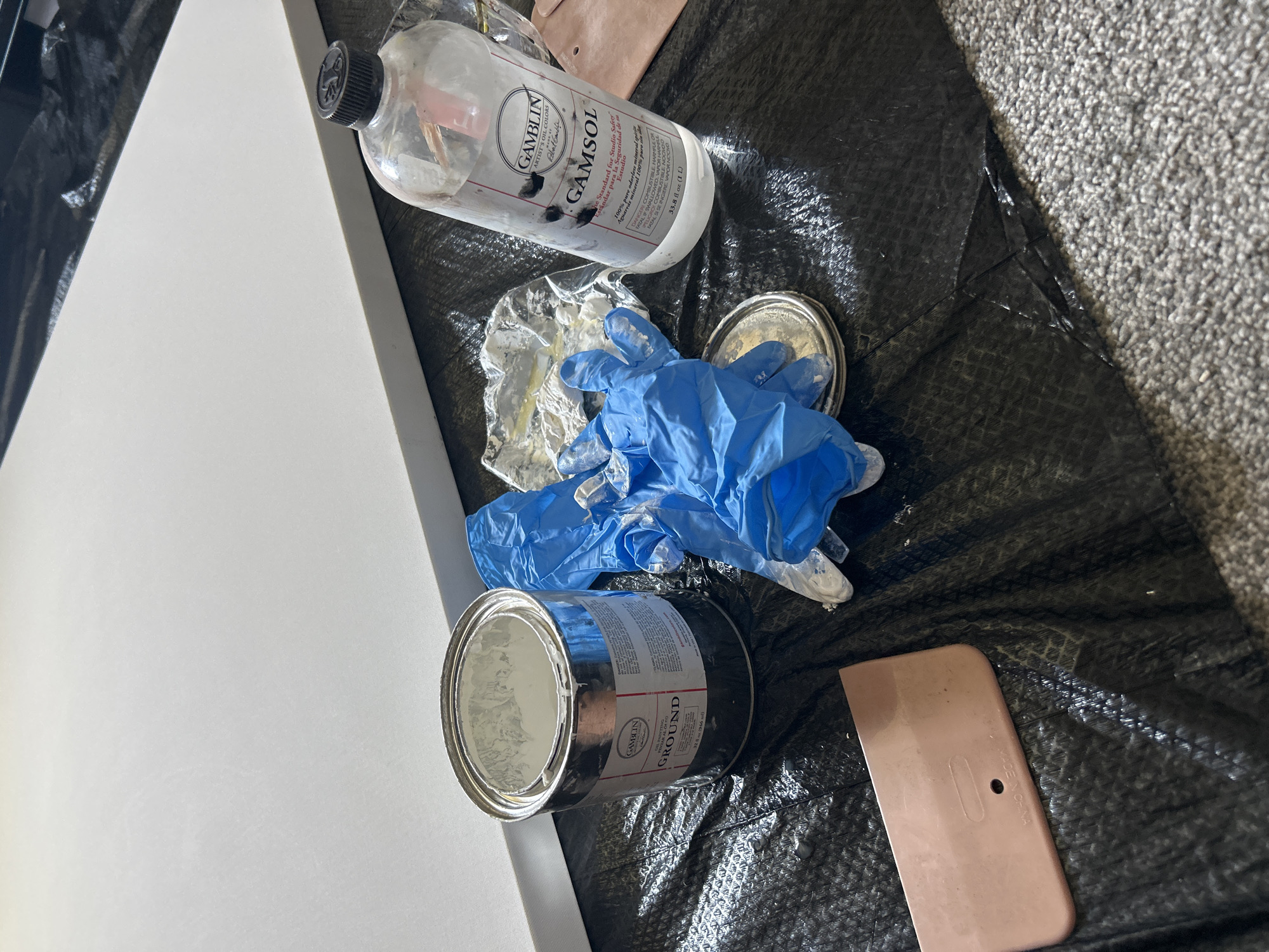 Artist works on painting project in Cape Coral studio