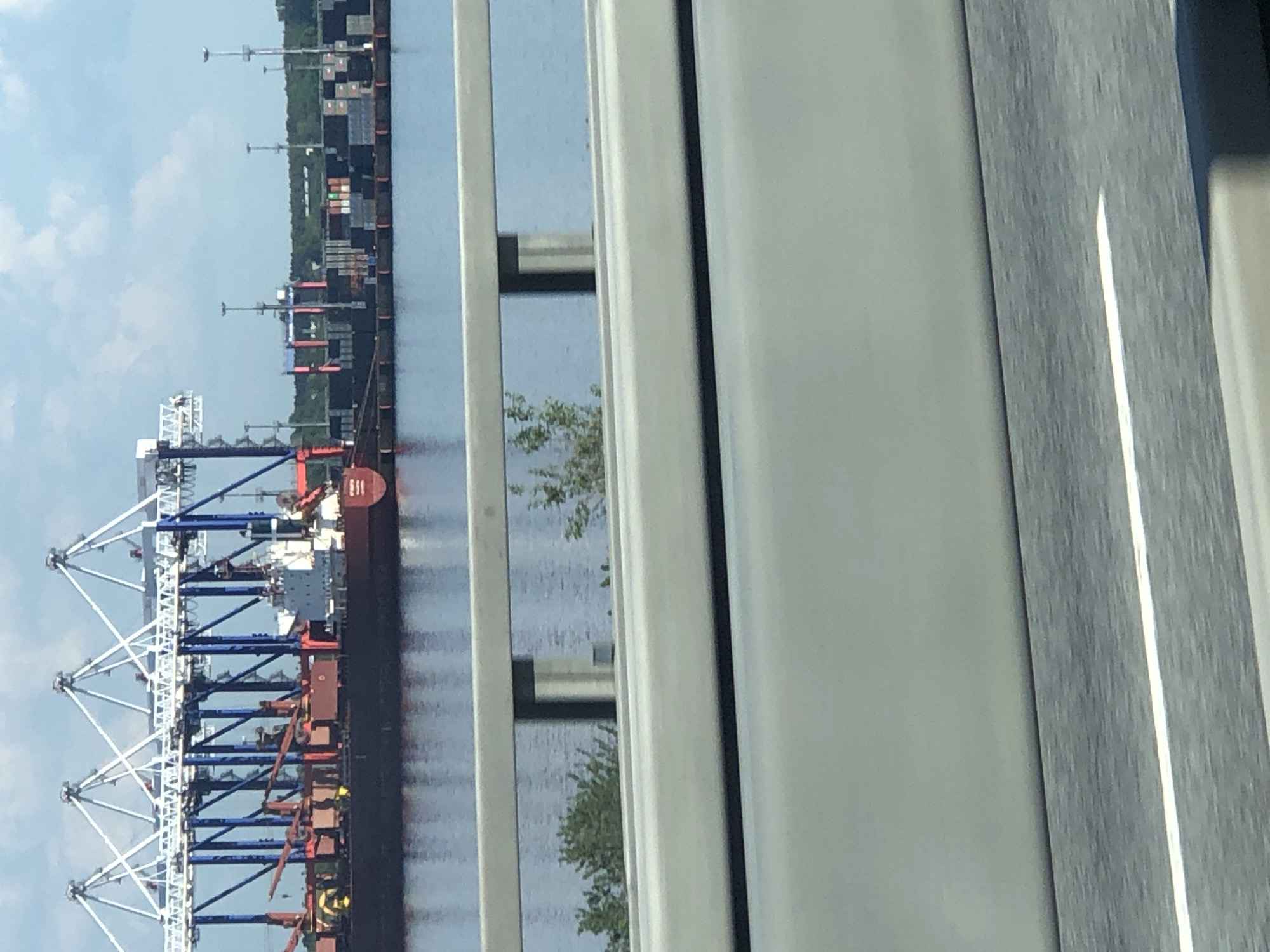 Motorist documents elevated highway travel through Kronstadt industrial port area