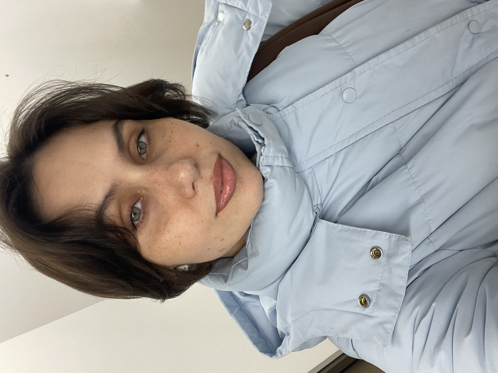 Woman documents personal moments in early morning Izhevsk session