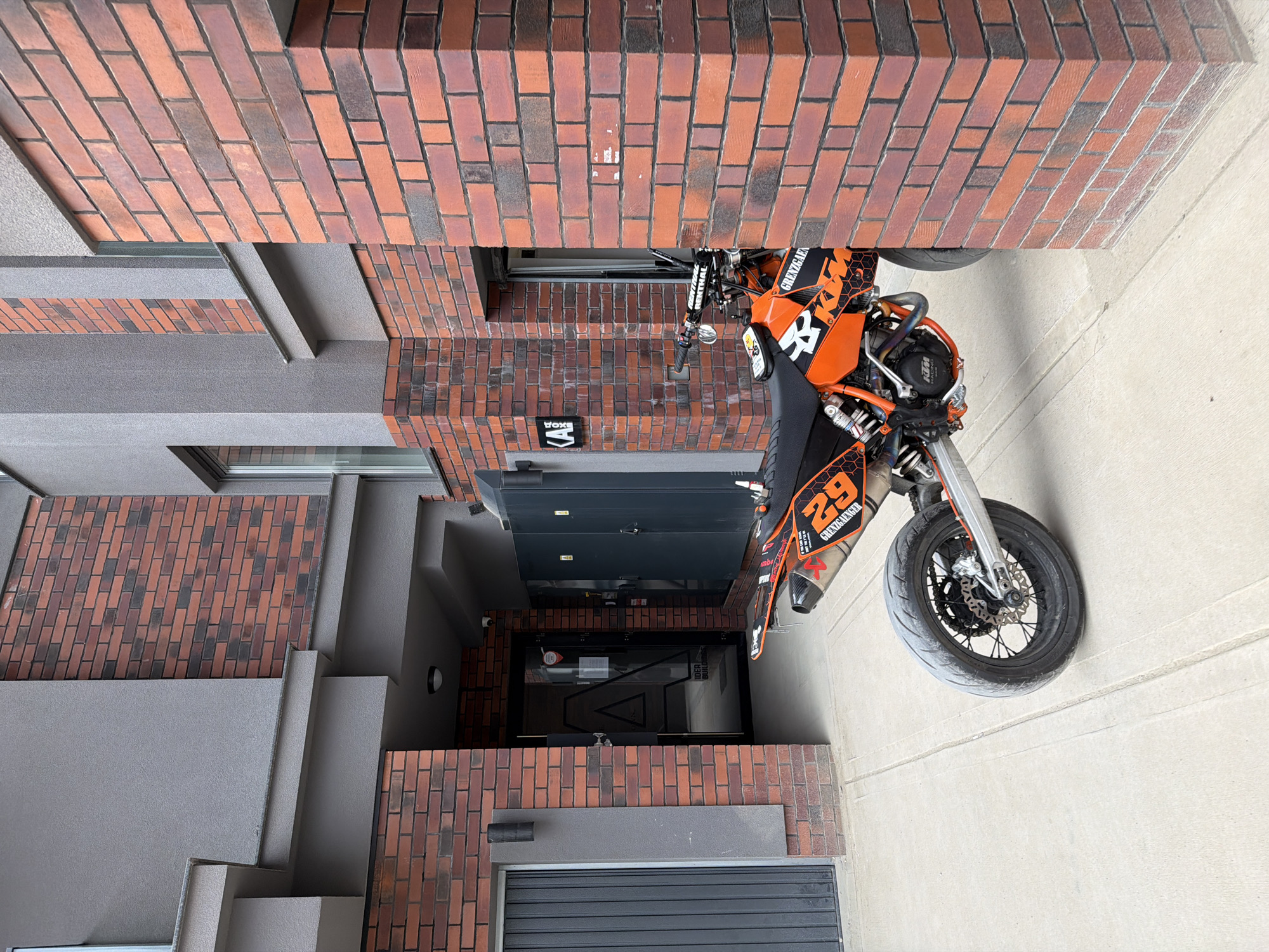 KTM motorcycle parked outside modern building in Sofia