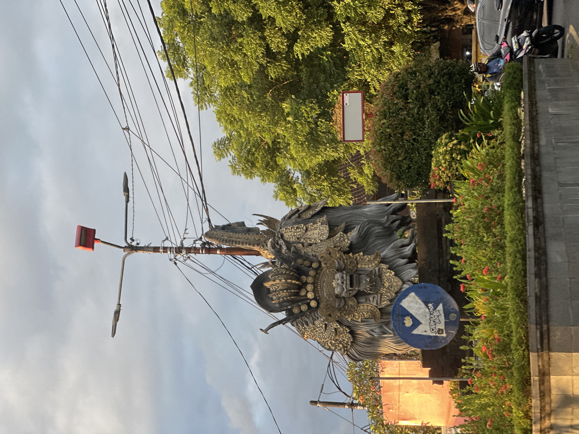 Traditional Balinese streetscape documented in Sukawati under grey skies