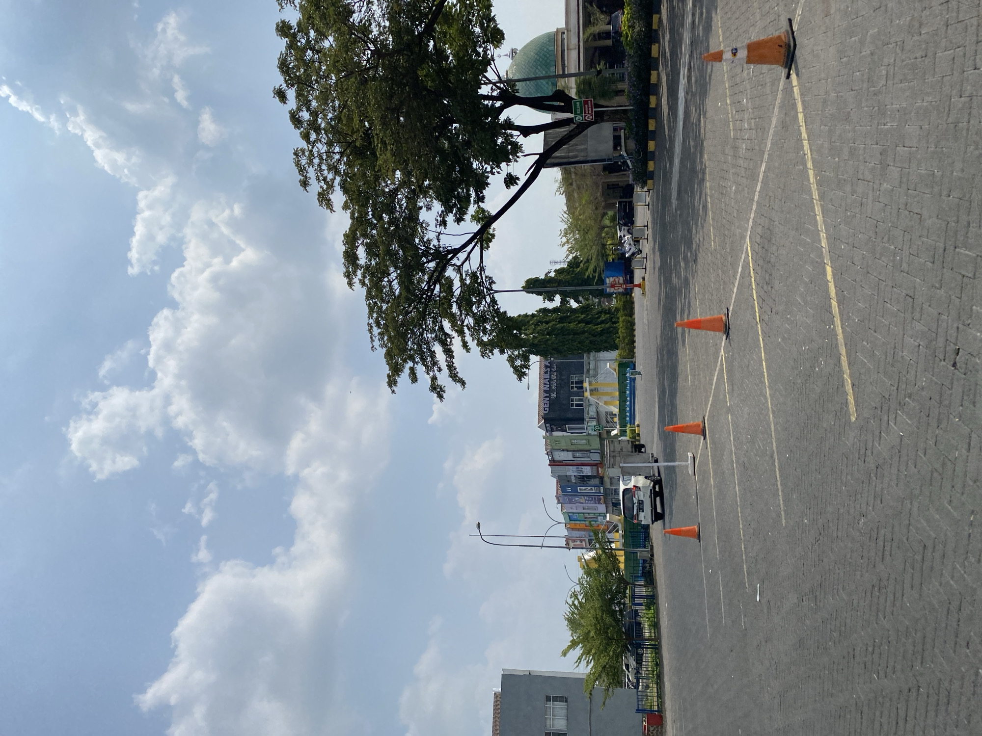 Quick stop in a Madiun parking area, motorcycles and street life
