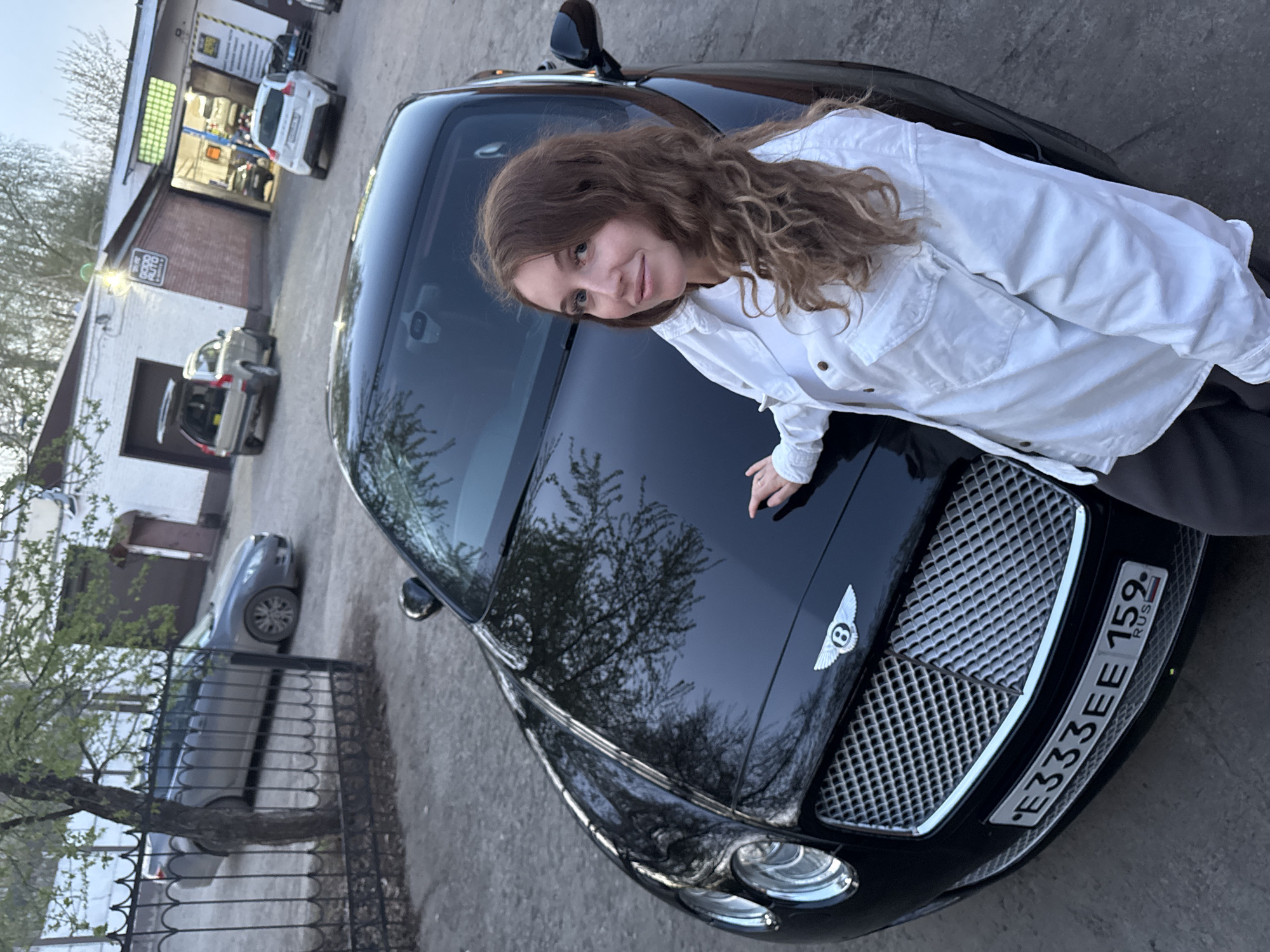 Woman documented with black Bentley across Chaikovsky, Russia locations