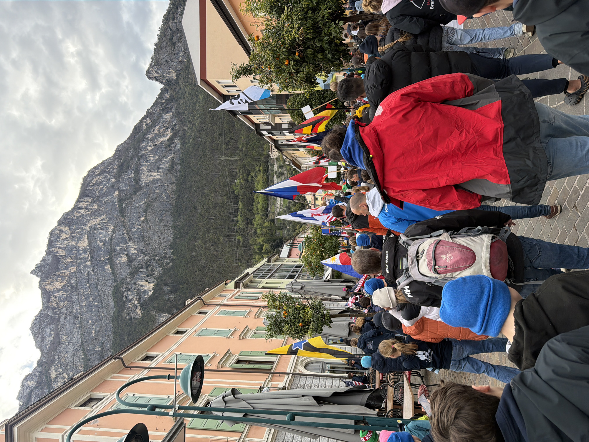 Crowded street scene captured in Riva del Garda, Italy