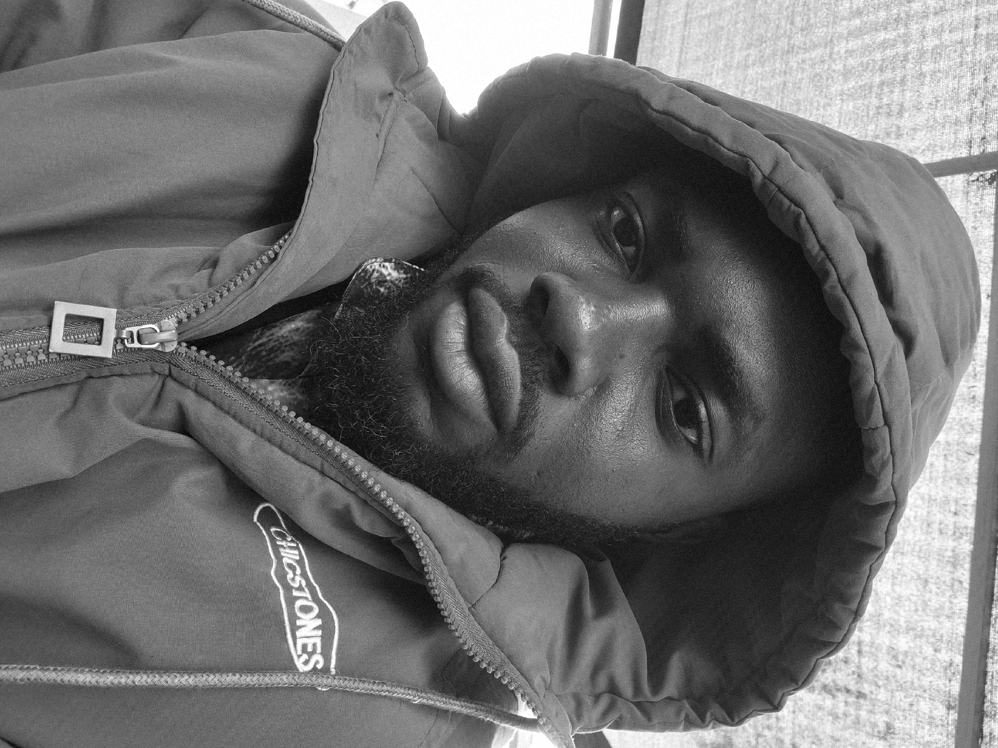 Man photographed with cat at Nigerian gas station