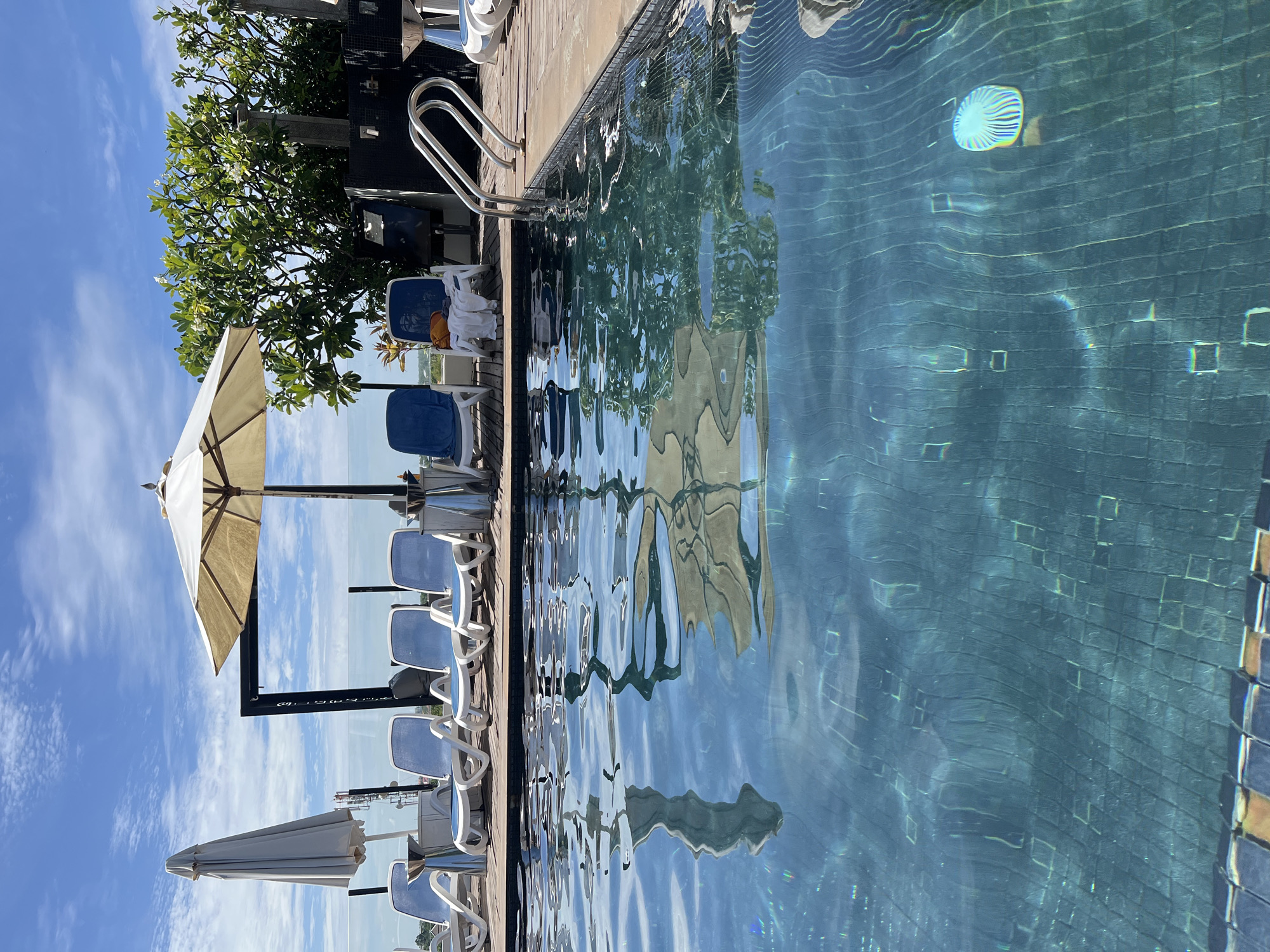 Early morning breakfast and poolside leisure documented in Siem Reap