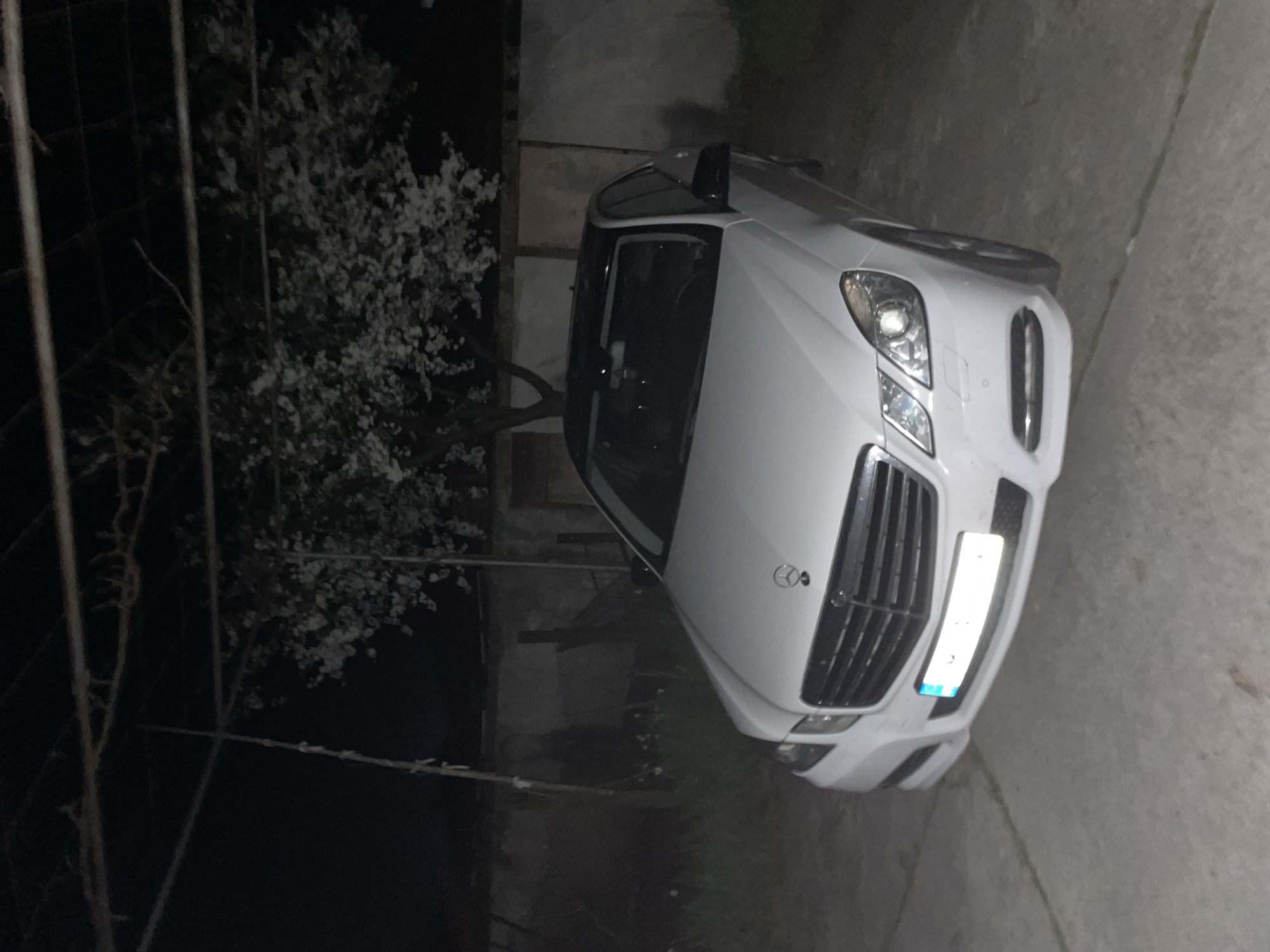 White Mercedes photographed with occupant in Zlatograd, Bulgaria