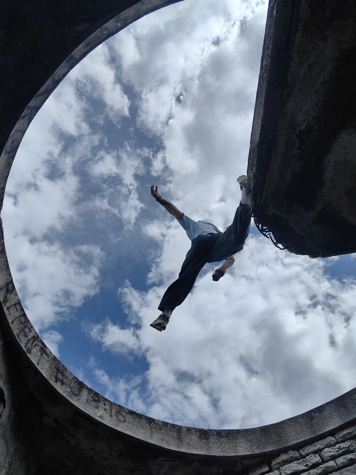 Person captured in dynamic pose from concrete structure in Varna