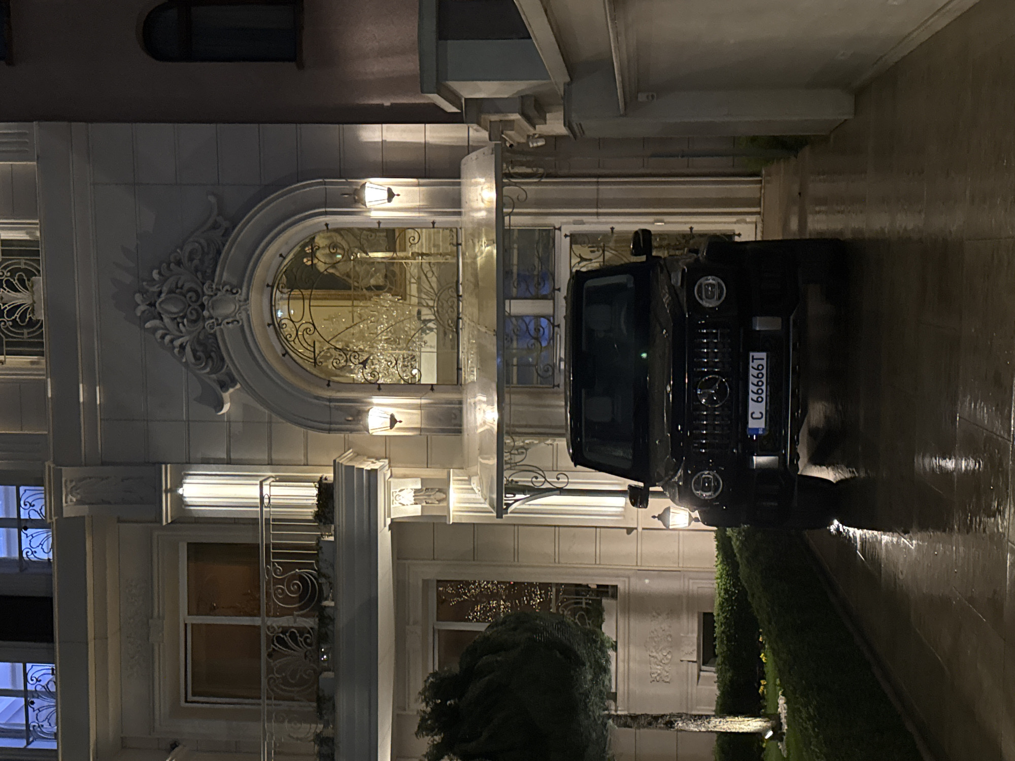 Black SUV parked outside ornate building in Sofia