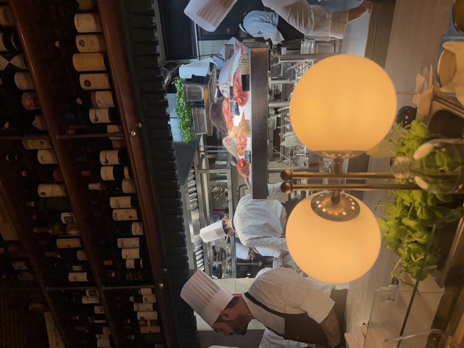Upscale Milan restaurant documented during evening dining service