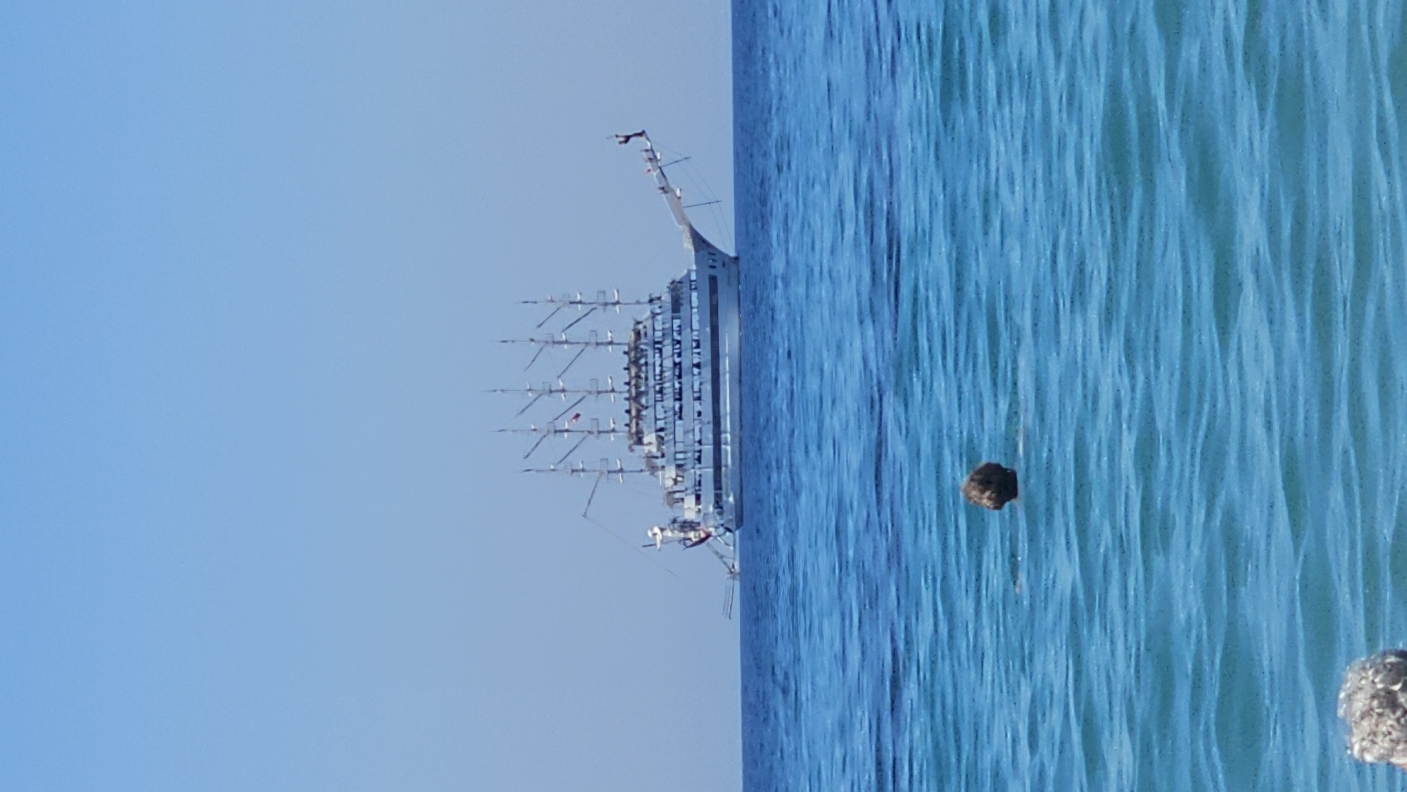 Pirate tour boats and swimmers on Alanya's Mediterranean coast