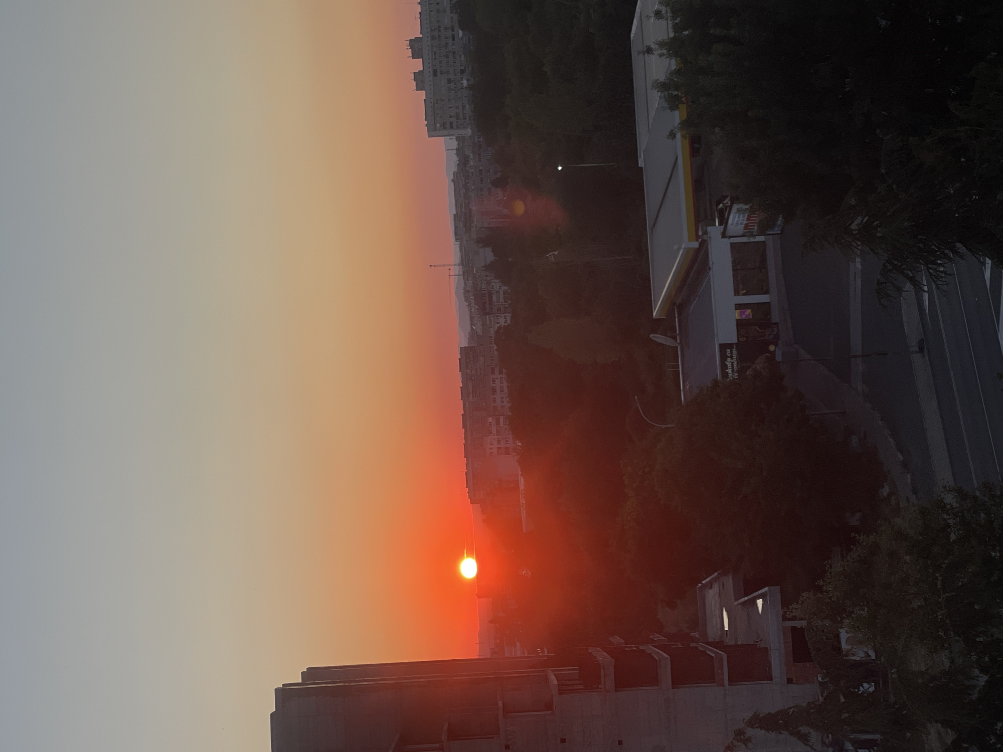 Warm sunset paints the Burgas skyline orange