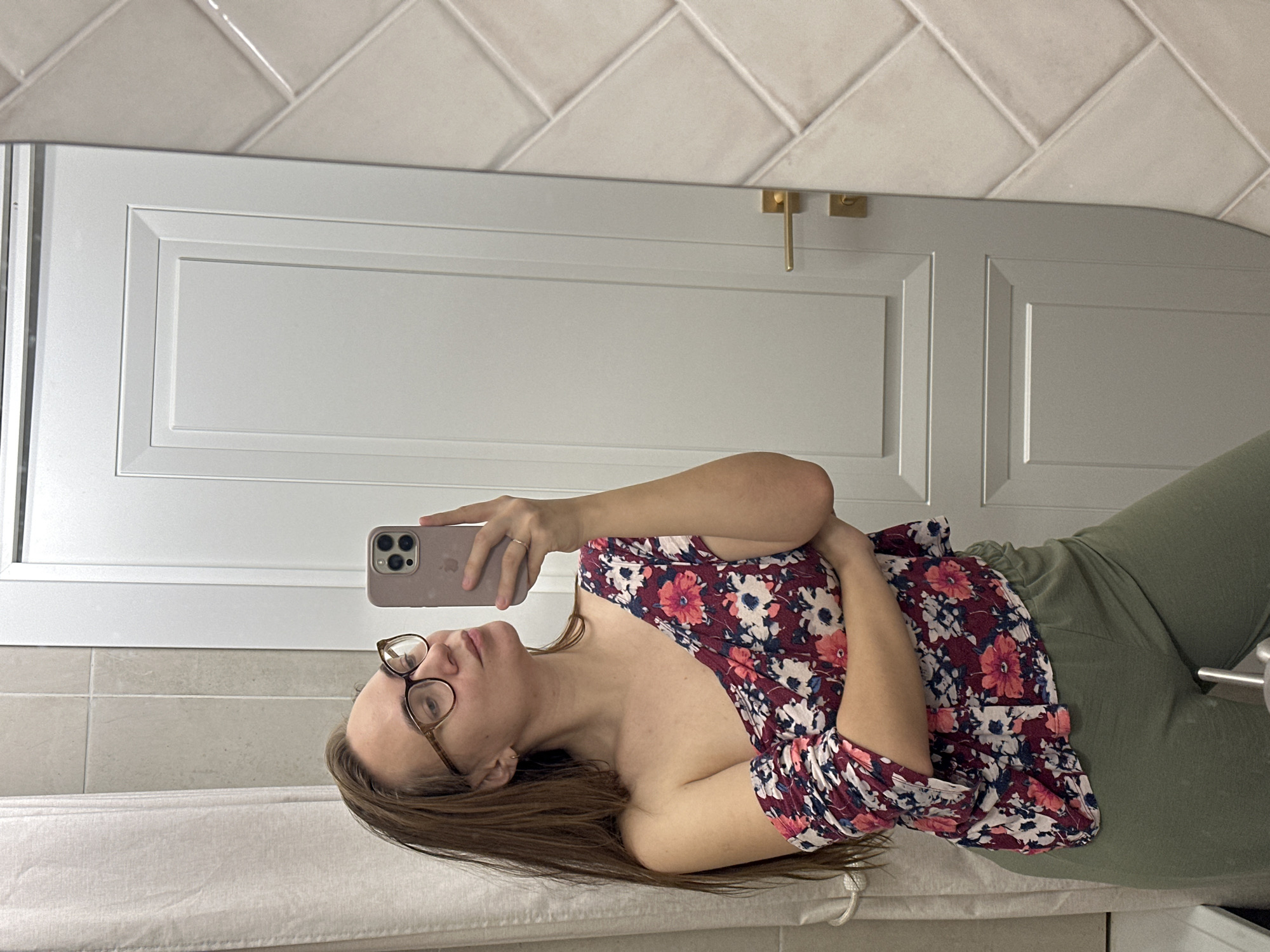 Woman documents flower delivery with selfies in Kharnavy