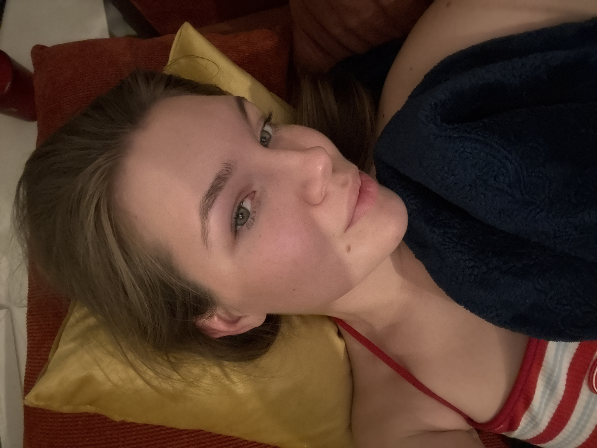 Woman rests on couch in Belgrade suburb