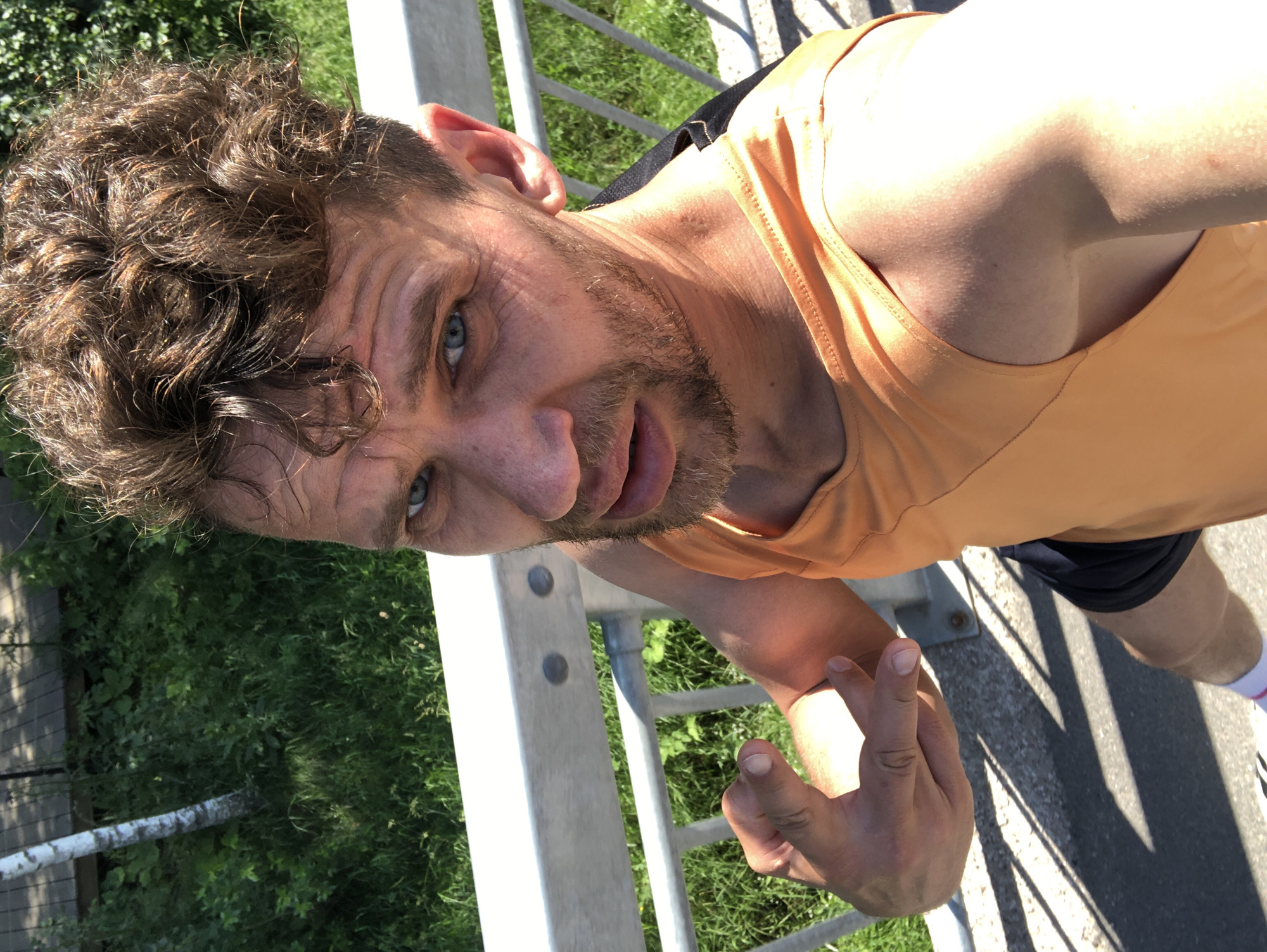 Selfie session on a Saint Petersburg pedestrian bridge, summer 2026