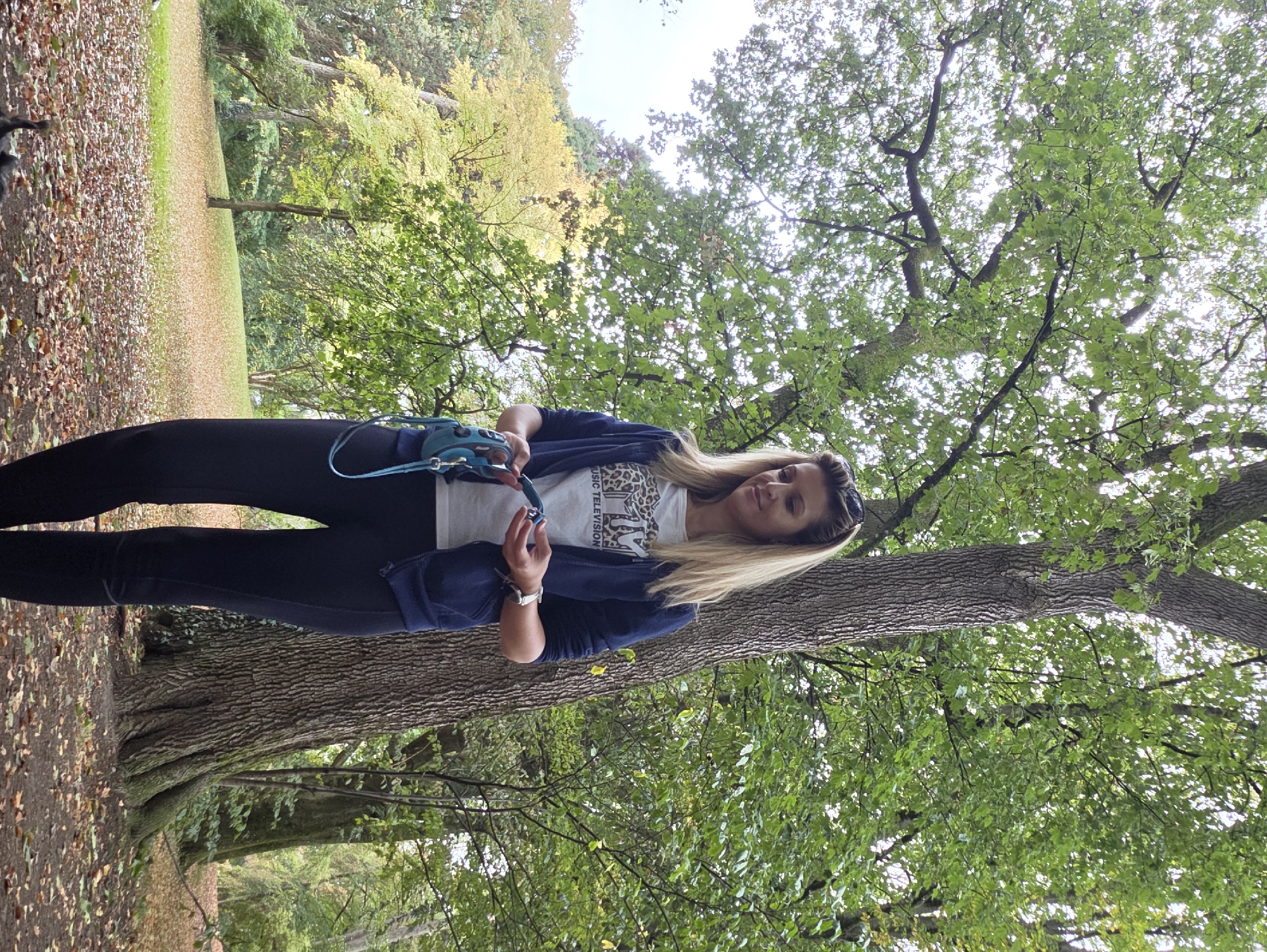 Morning park outing in Munich with a dog in tow