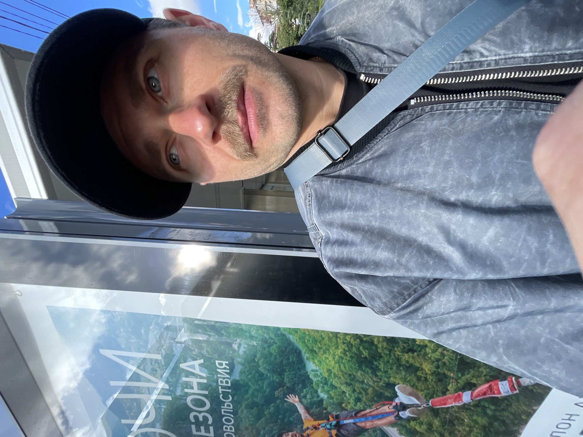 Tourist documents rainy day sightseeing in Sochi, Russia