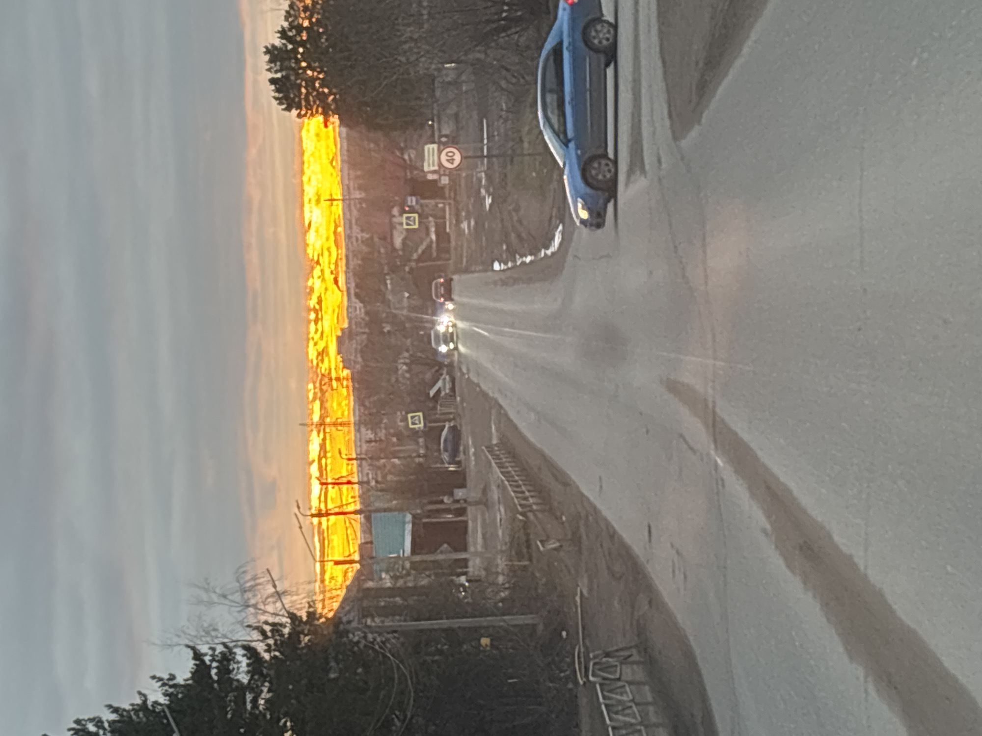 Golden sunrise captured over Chaikovsky roads, indoor portrait documented