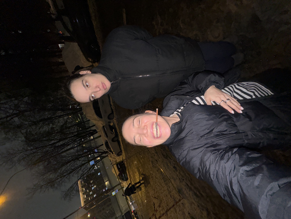 Nighttime street photos capture playful moments in snowy Moscow