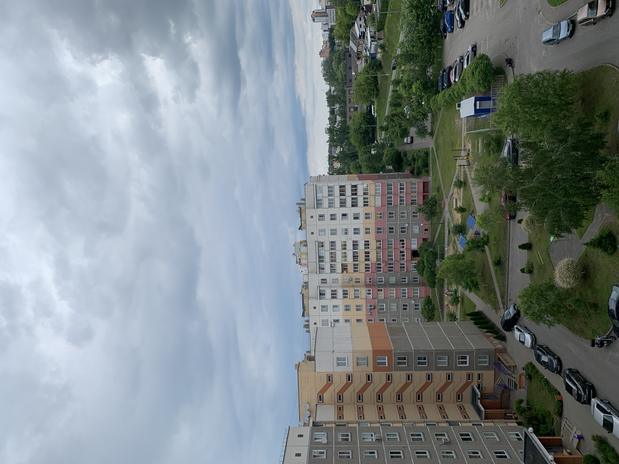 Daily life documented in Hrodna residential complex under cloudy skies
