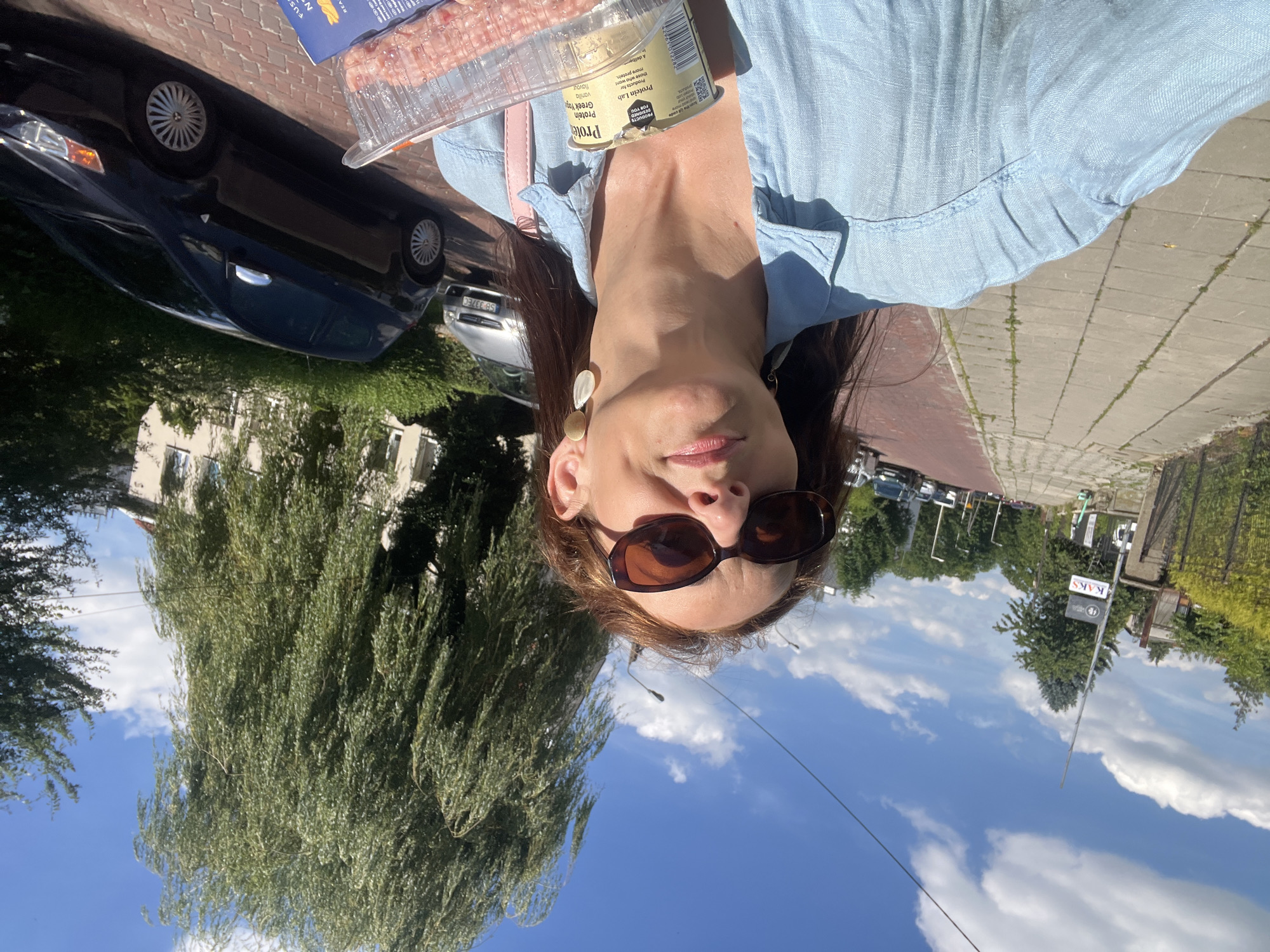 Sunny city stroll, mirror selfies, and a coffee cup sky