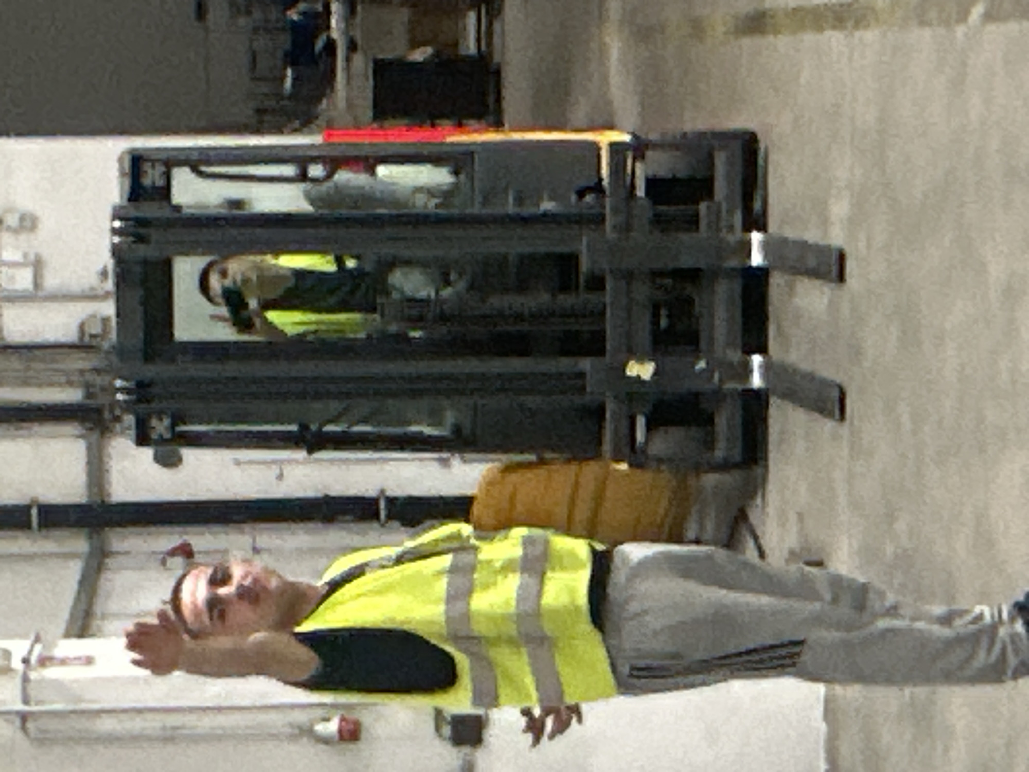 Late-night warehouse hangout in Schweitenkirchen, safety vests and all