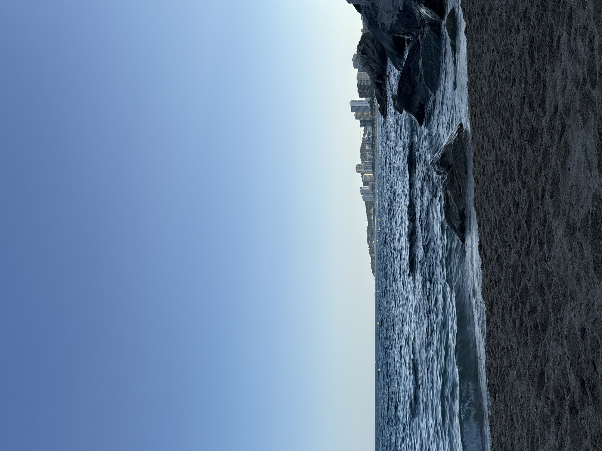 Afternoon on the Costa Brava: coastline, tattoos, and beach textures