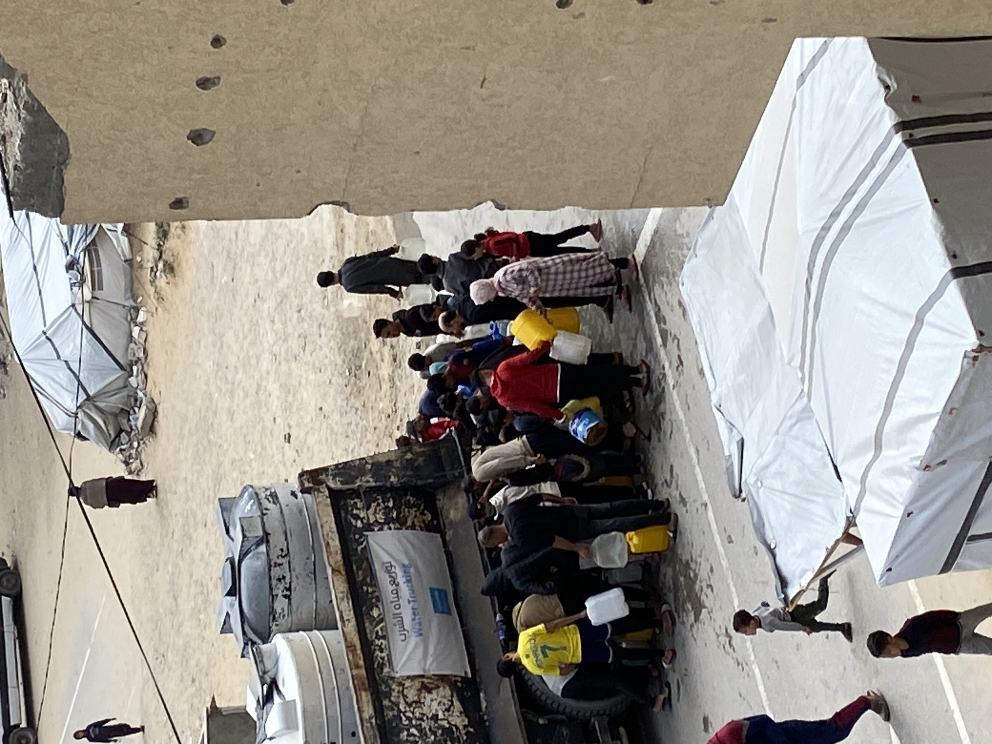 Water distribution observed at Khan Yunis relief camp