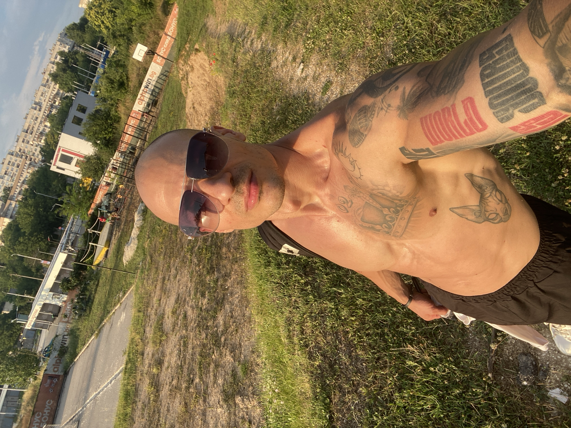 Tattooed selfie in a Pleven park, summer afternoon