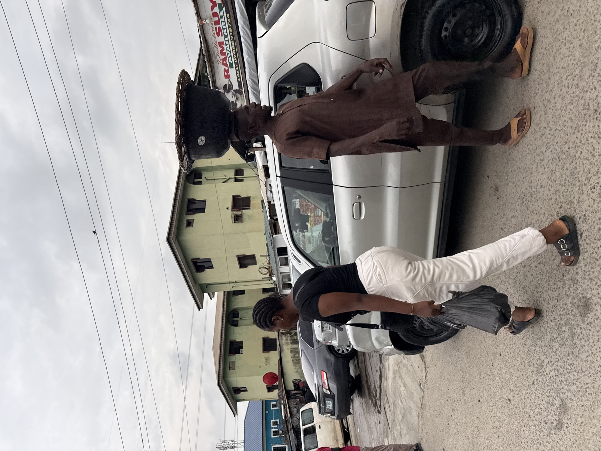 Street life and commerce moving through Ado, Nigeria