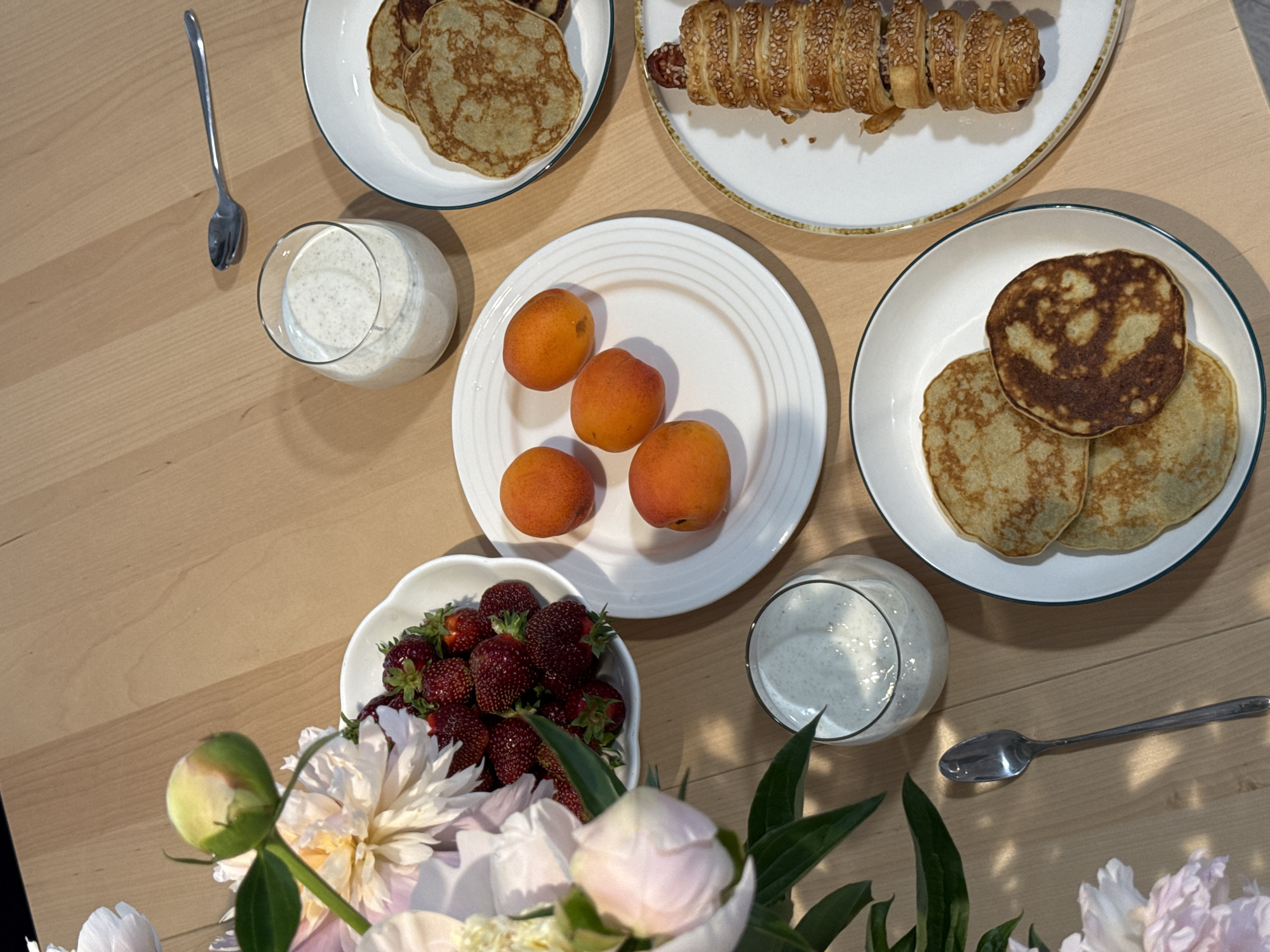 Styled home breakfast with peonies and fresh fruit, Izhevsk