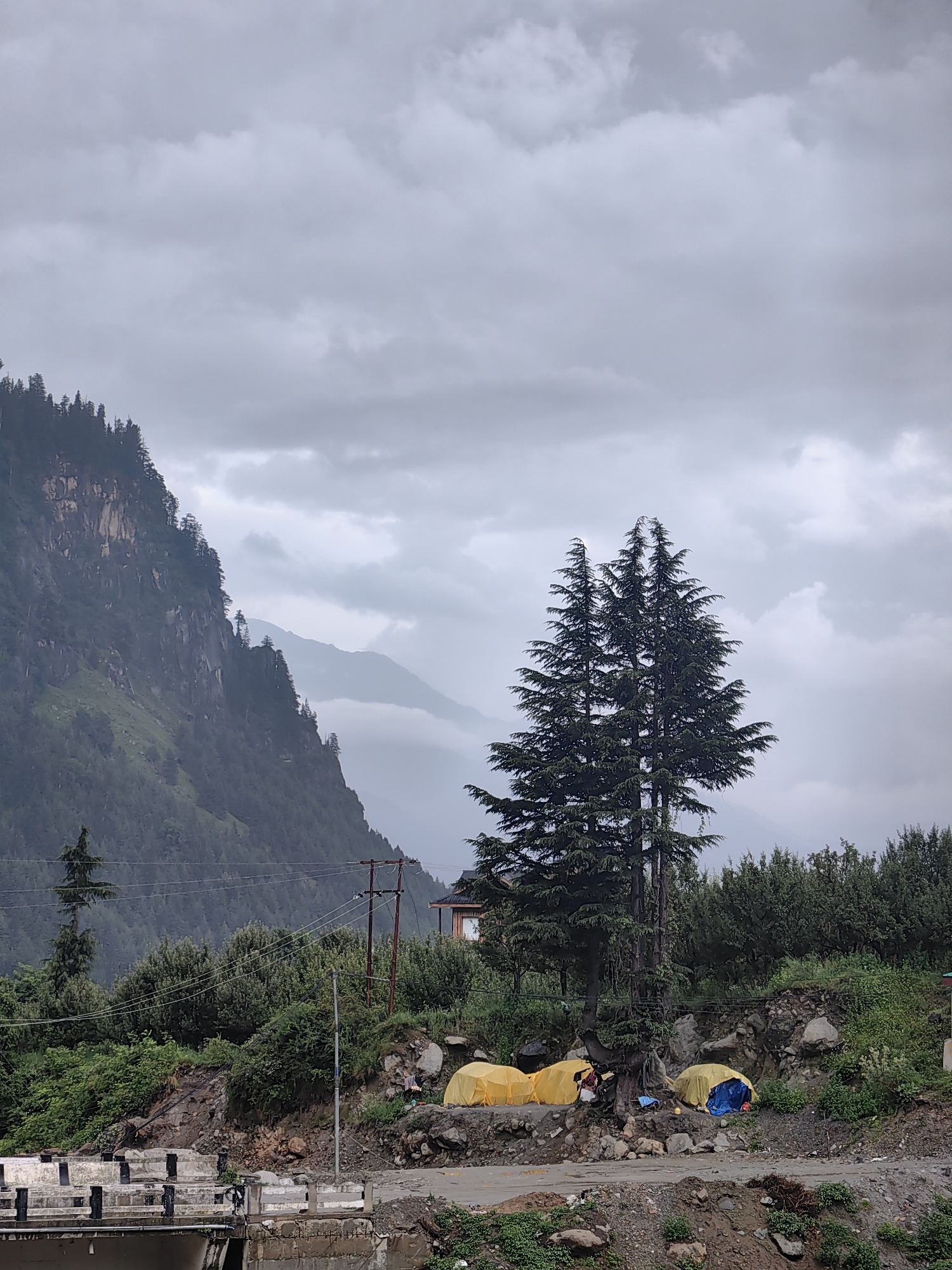 Stormy conditions and rushing floodwater at a Palchan campsite