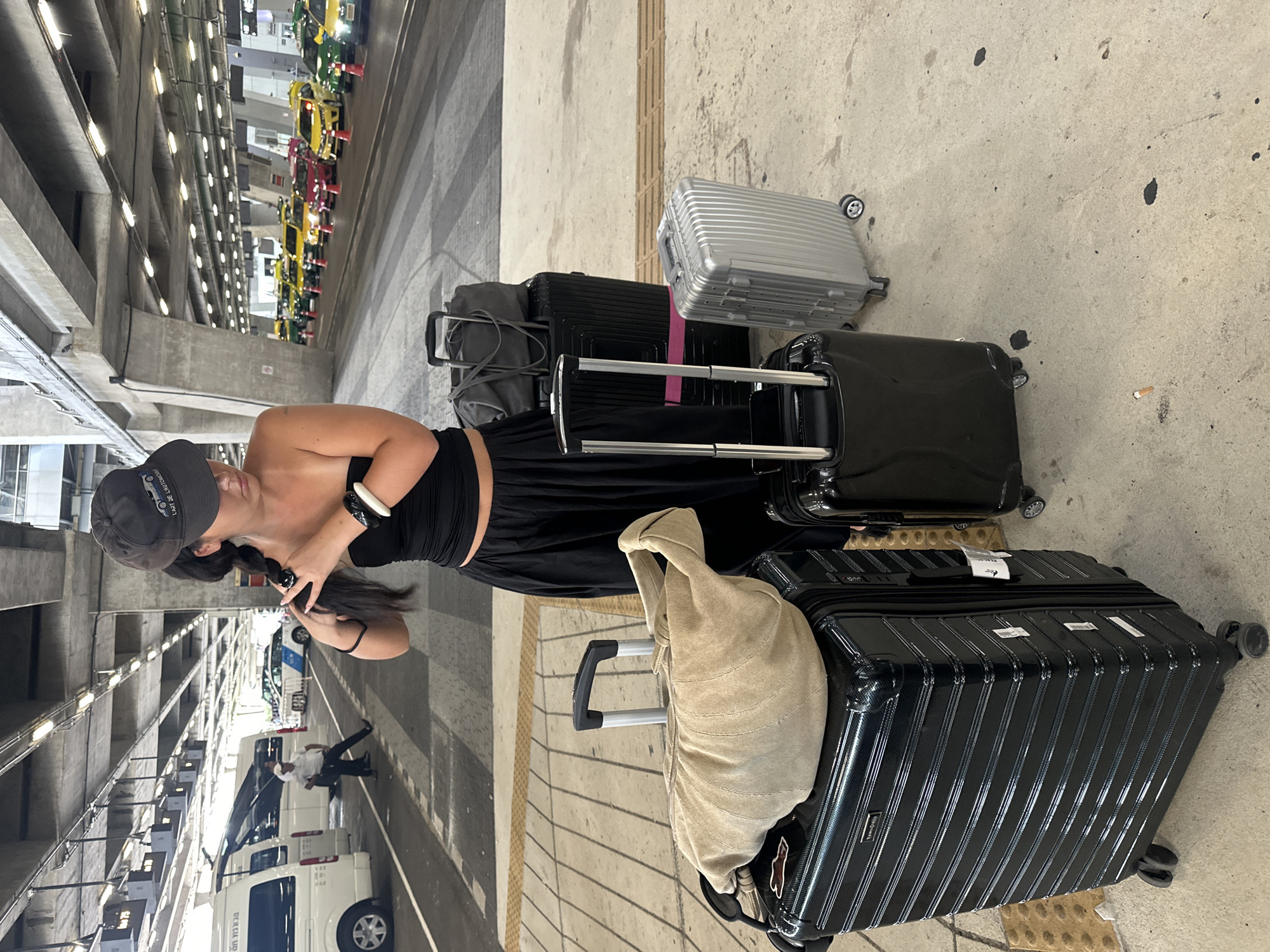 Woman with luggage spotted at Thailand transportation hub