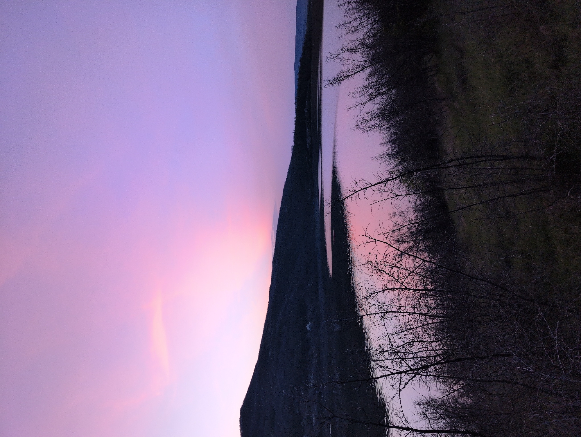 Twilight scene captured near Buhovtsi, Bulgaria shows colorful sky reflection