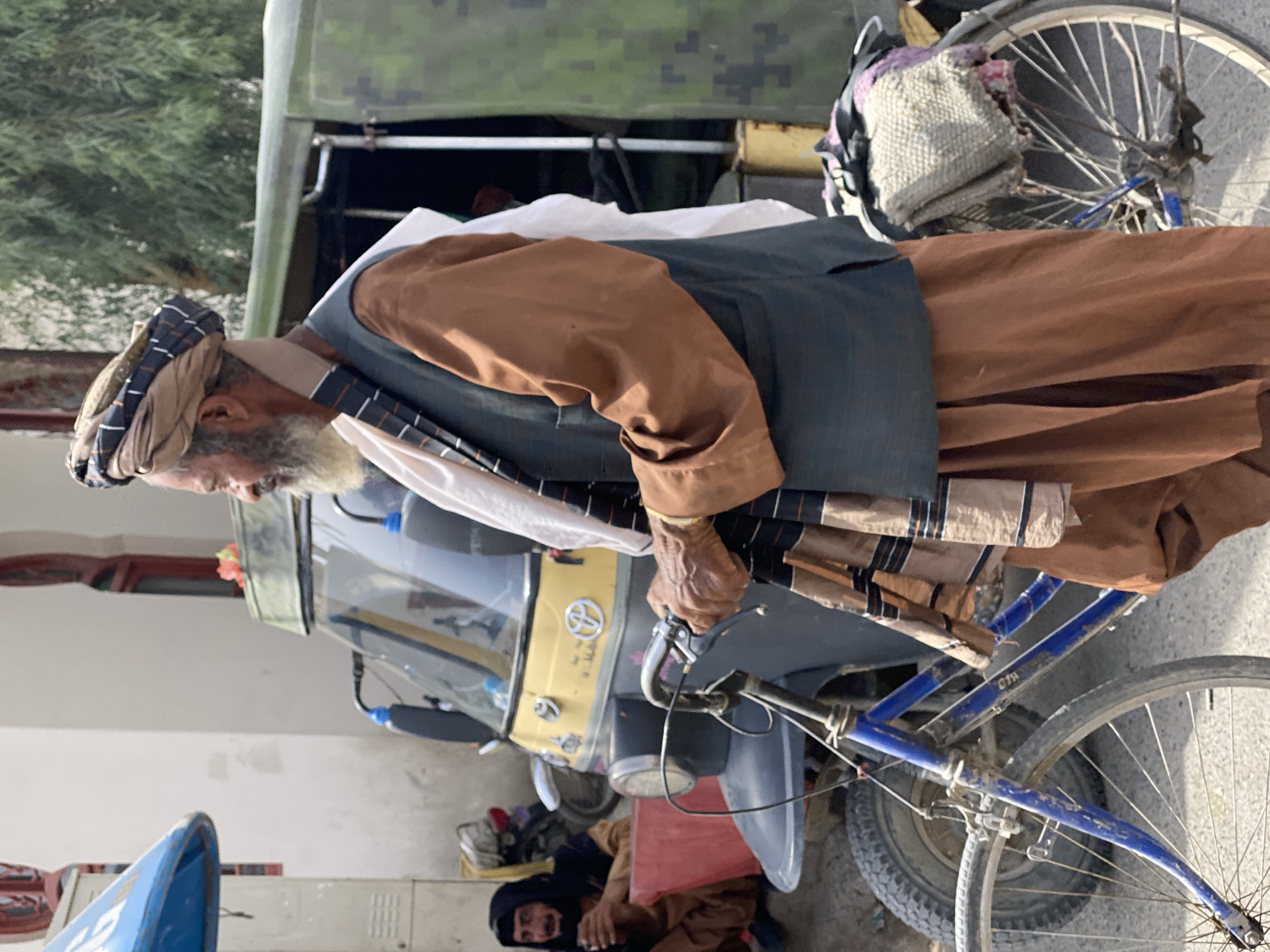 Everyday street life moving through central Kandahar