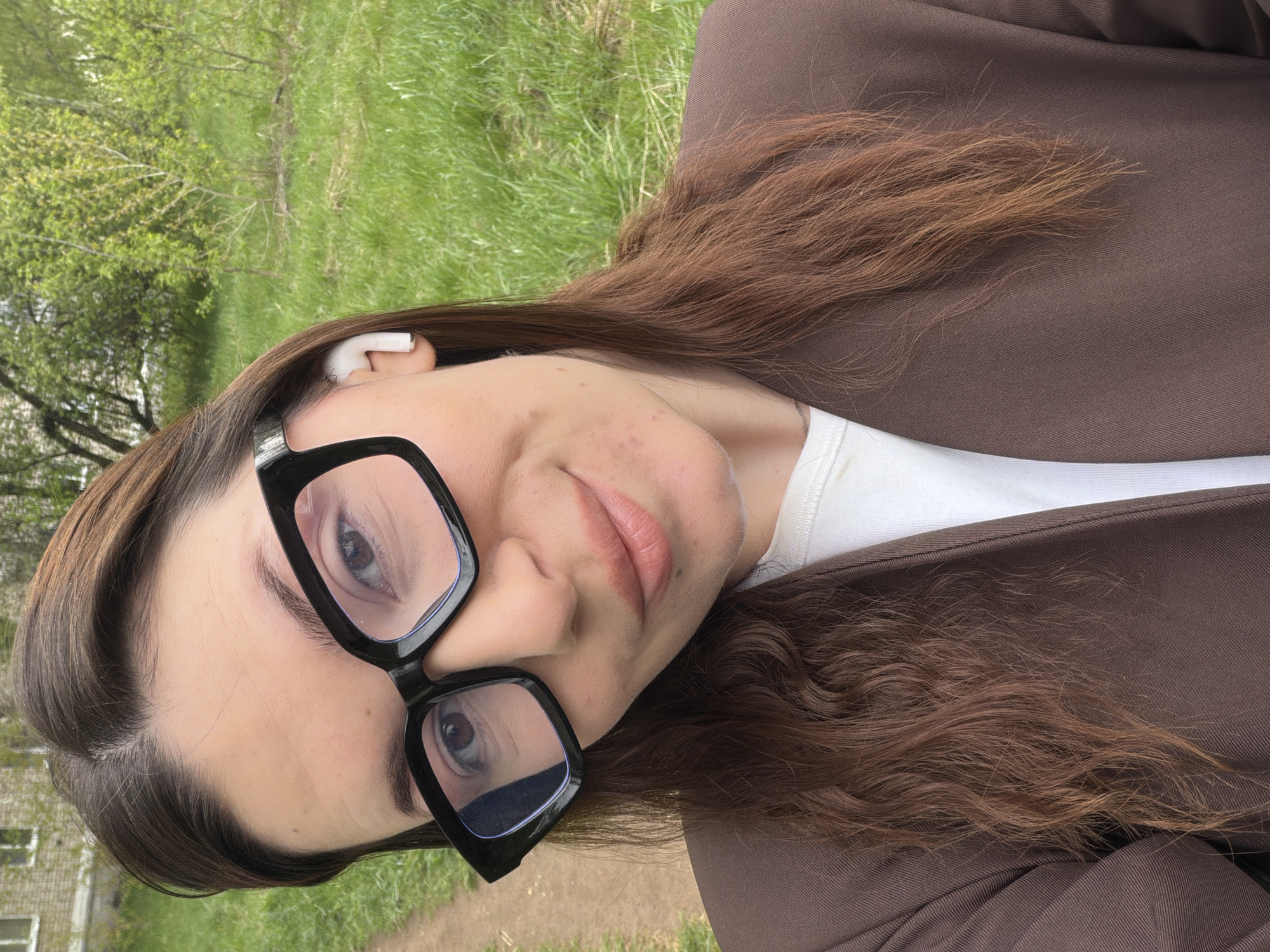 Woman takes selfies in different outfits in Chaikovsky, Russia