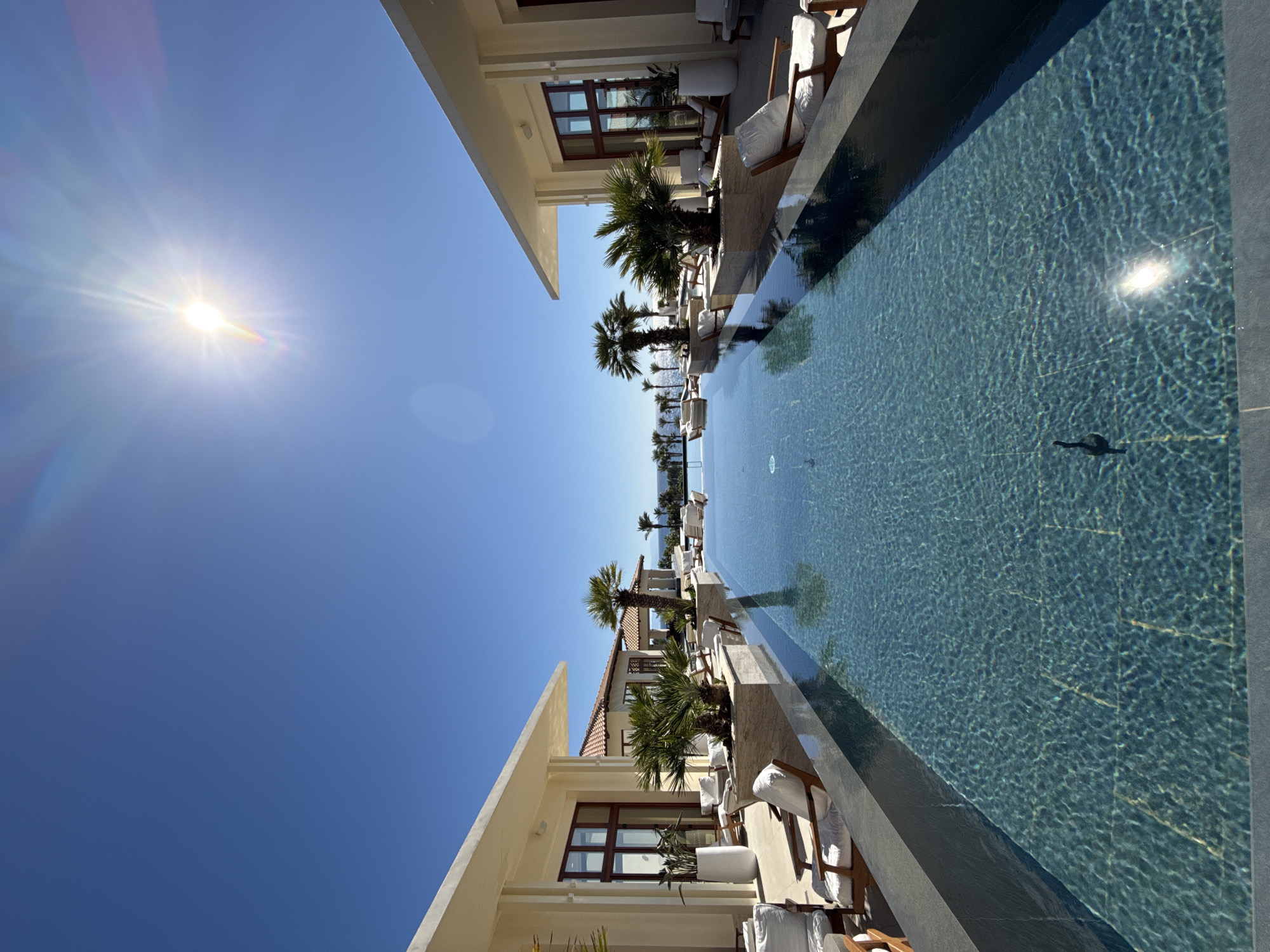 Morning resort pool scene captured in Kos, Greece