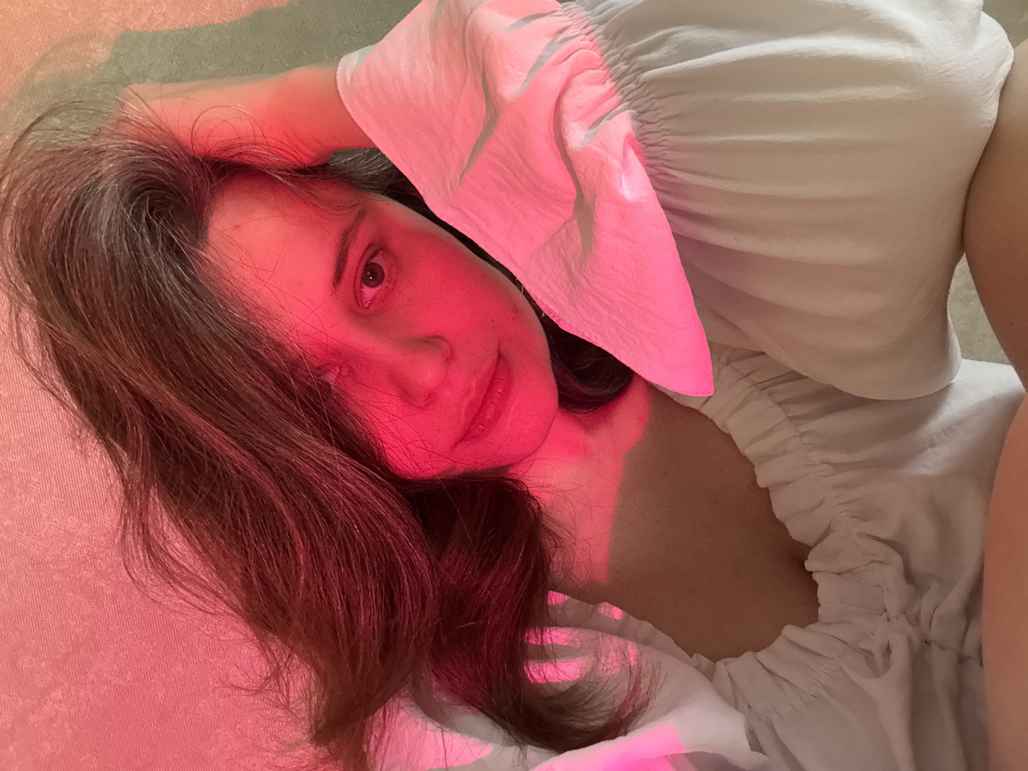 Indoor moments captured in Chaikovsky: woman resting, cat watching spider