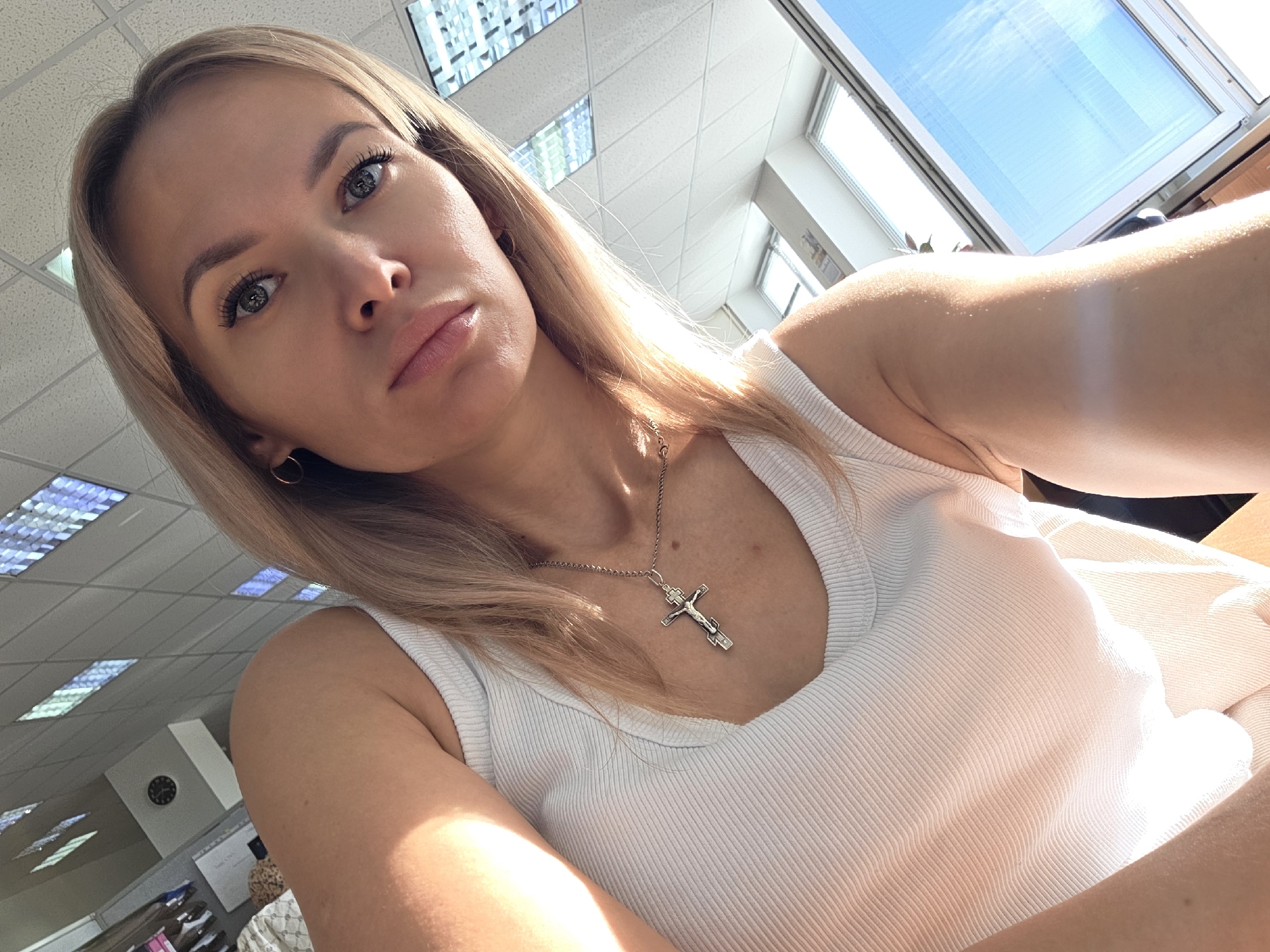 Indoor selfie and a quiet rural road in Chaikovsky, Russia