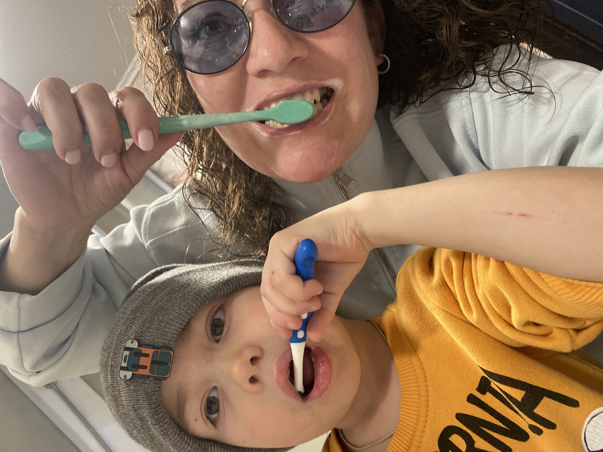 Mother and child share morning tooth-brushing routine in Russia