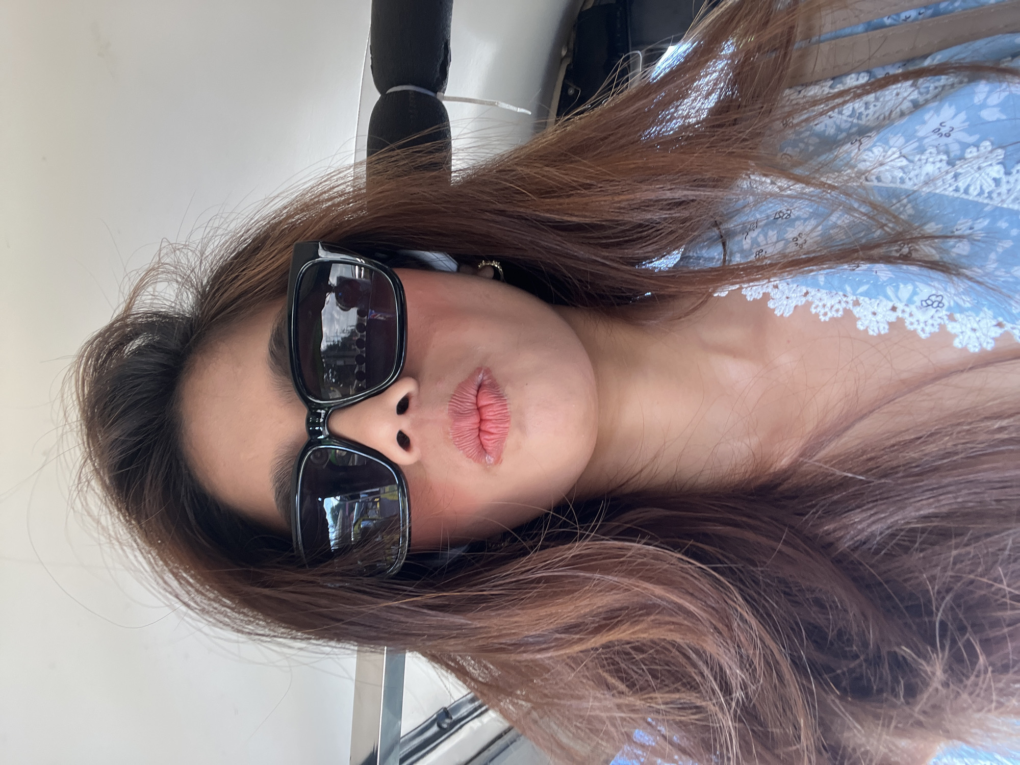 Woman takes selfies during tuk-tuk ride in Panabo City