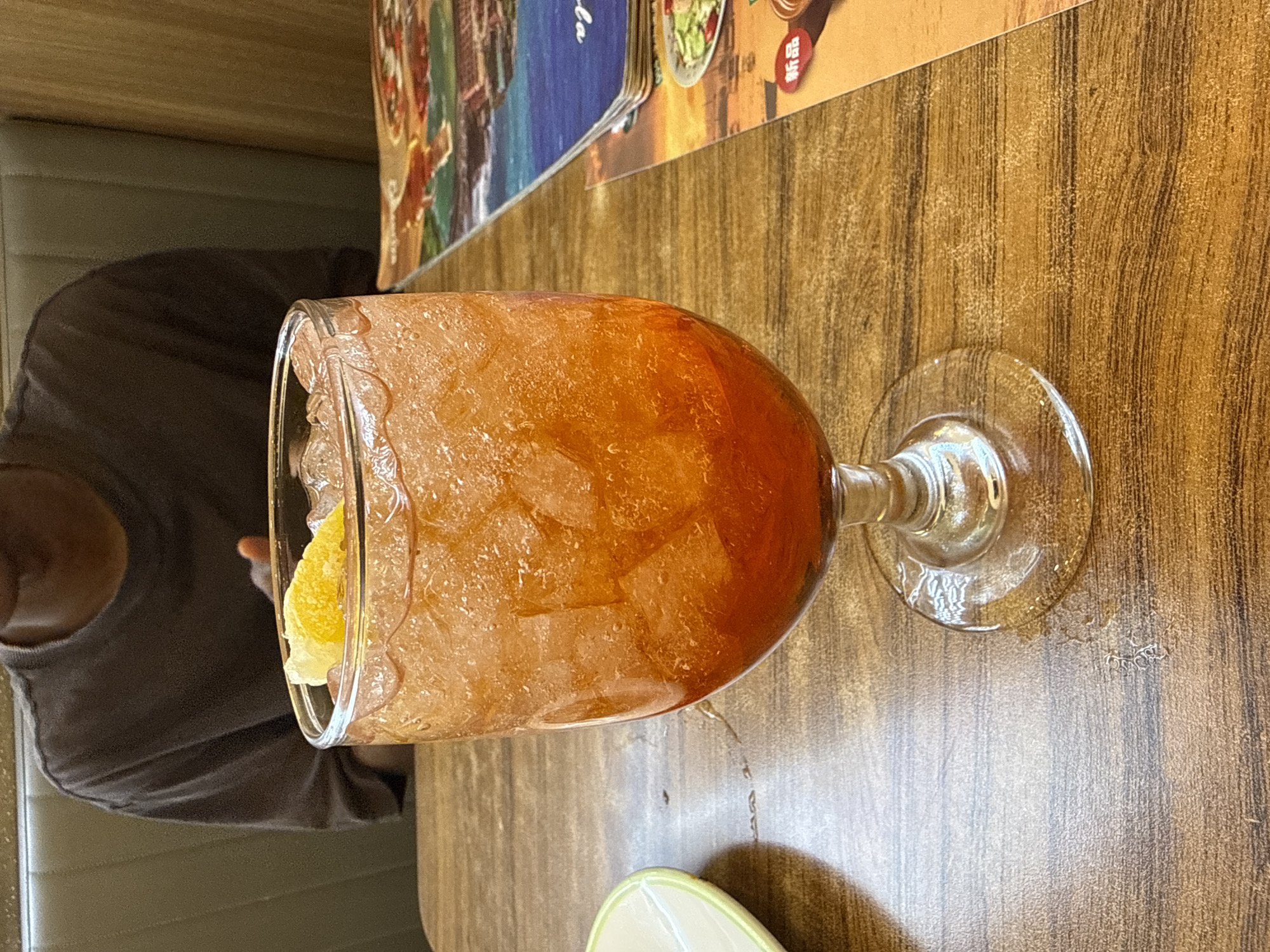 Pasta, quiche, and an iced drink on a table in Daxing