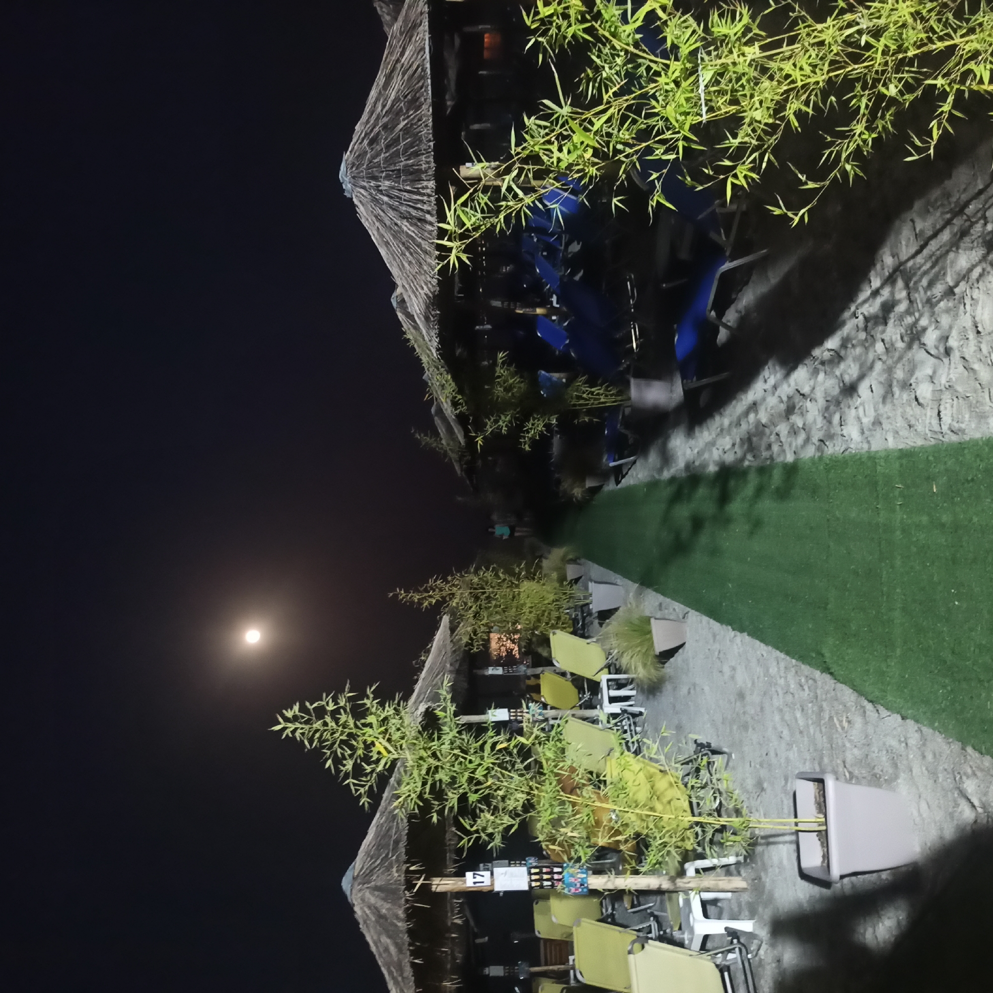 Pebble beaches and moonlit coast along northern Greece at dusk