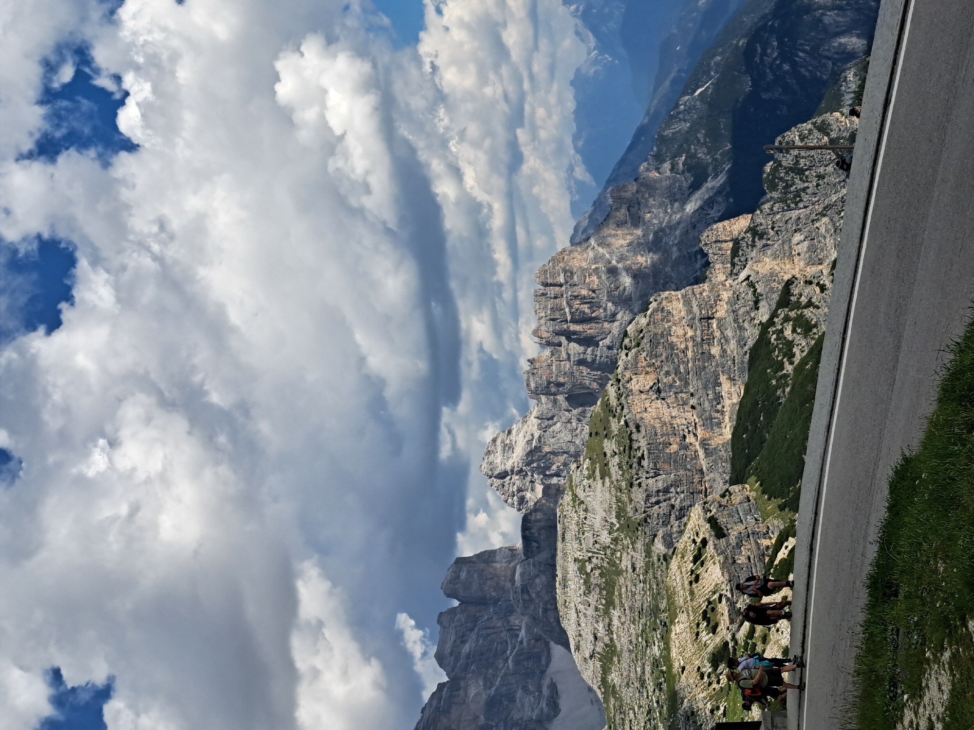 Exploring a rugged mountain landscape from road to ridgeline